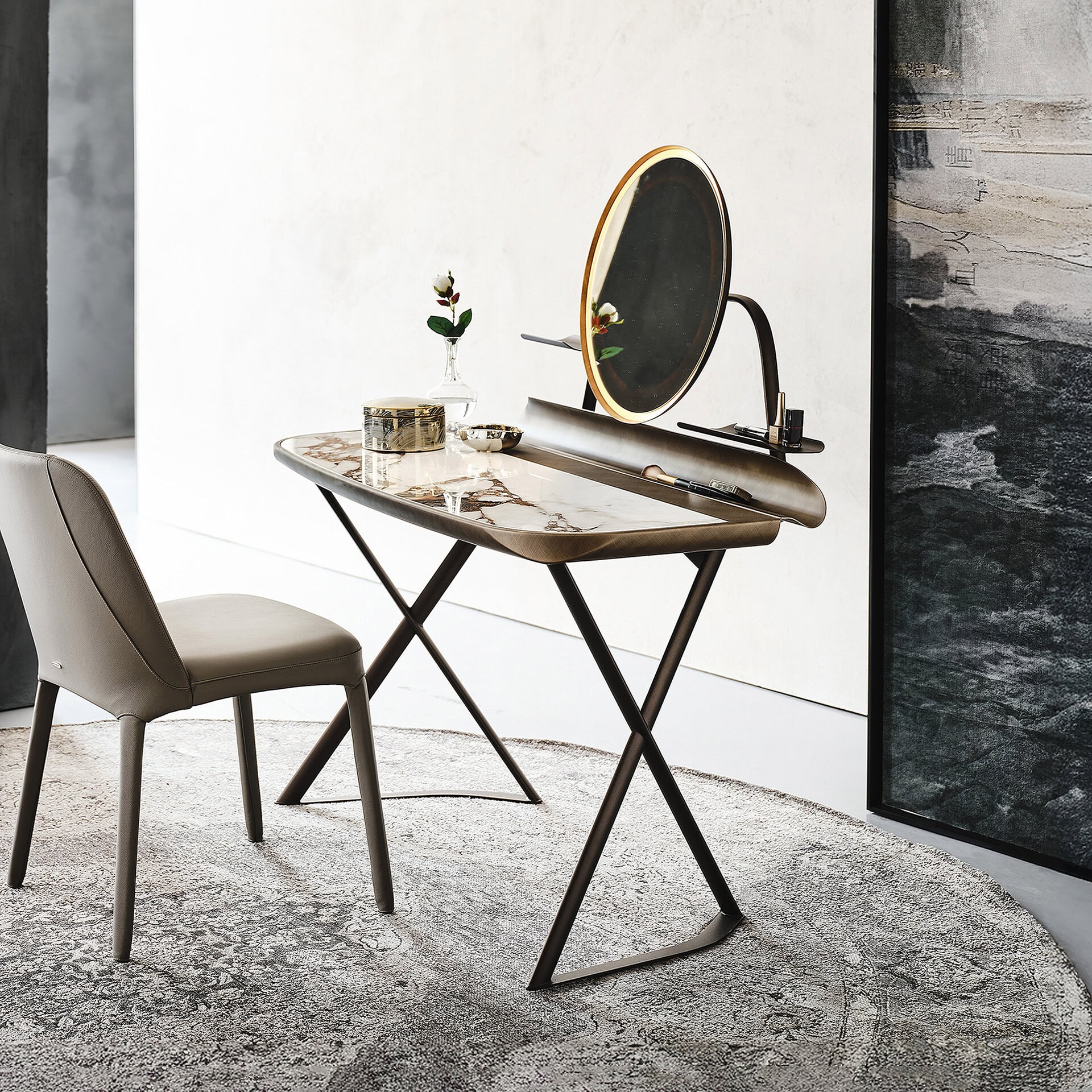 Vanity desk with ceramic top and round mirror paired with an upholstered chair in a modern bedroom setting.