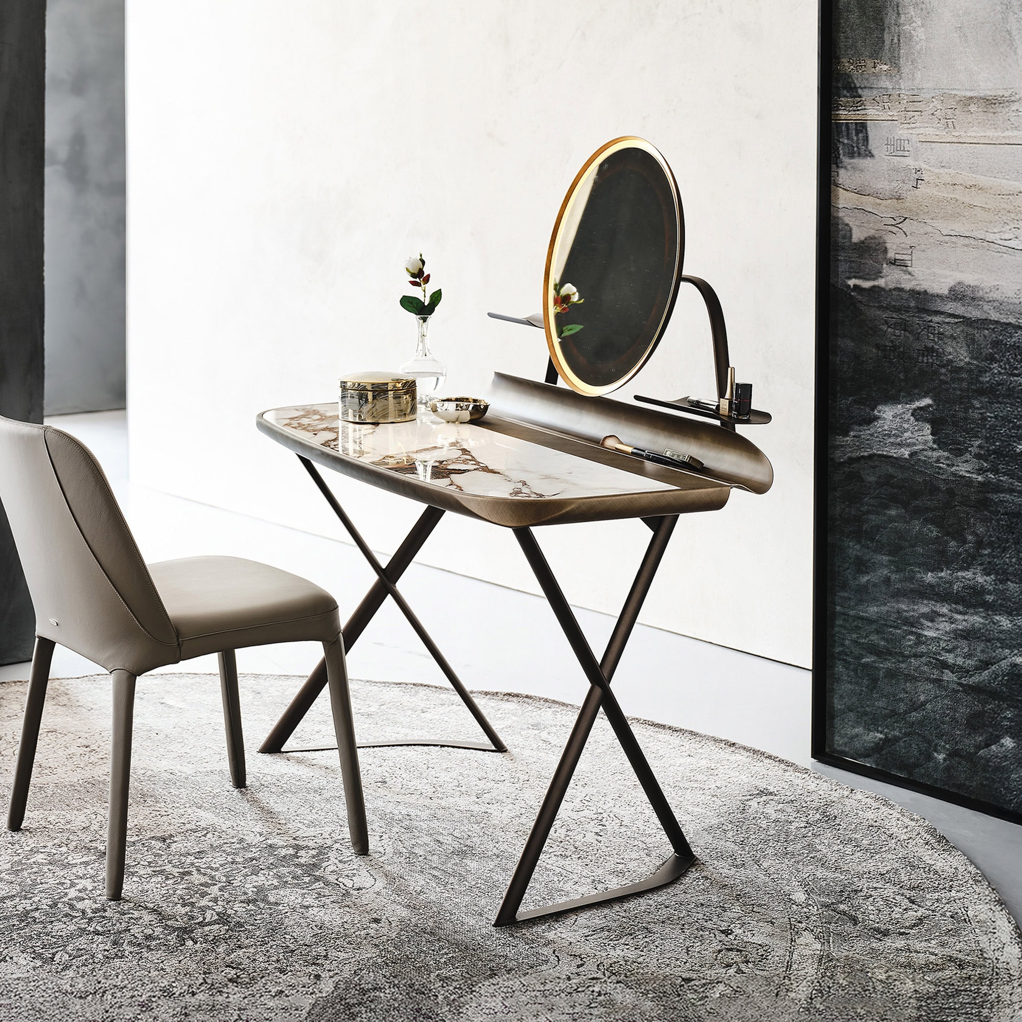 Vanity desk with ceramic top and round mirror paired with an upholstered chair in a modern bedroom setting.