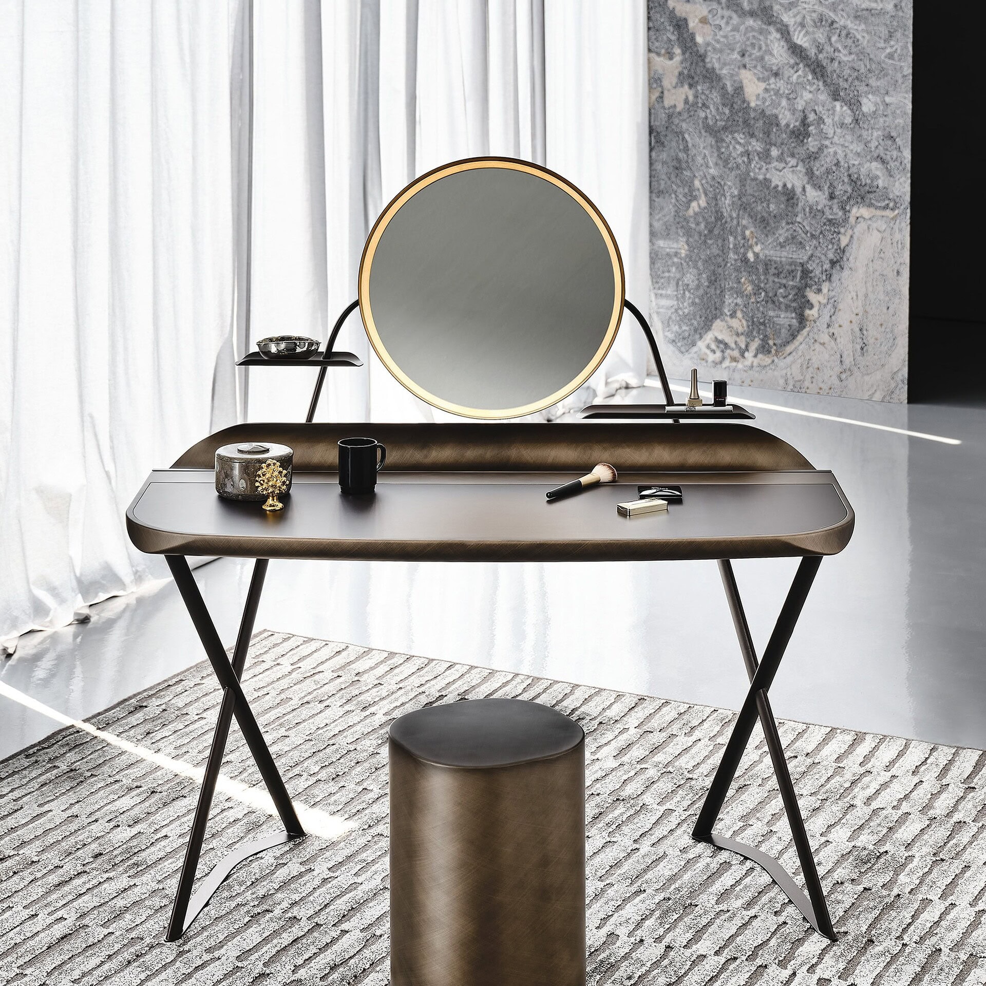 Full view of vanity desk with ceramic top, LED-lit mirror, and matching stool in front of windows.