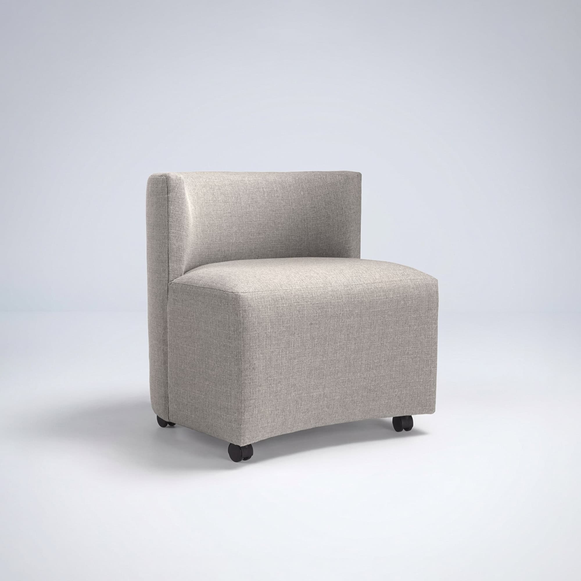 Mandalay Rolling Game Chair in light gray fabric upholstery, armless design with a boxy silhouette, and smooth black casters for mobility.