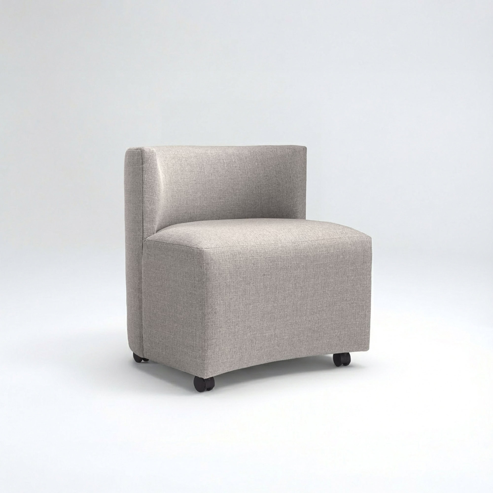 Mandalay Rolling Game Chair in light gray fabric upholstery, armless design with a boxy silhouette, and smooth black casters for mobility.