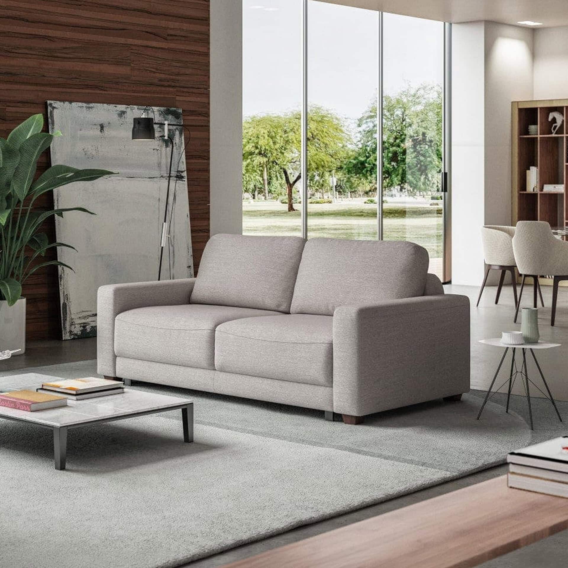 Comfortable Belton Queen Size Sleeper Loveseat in modern living room setting.