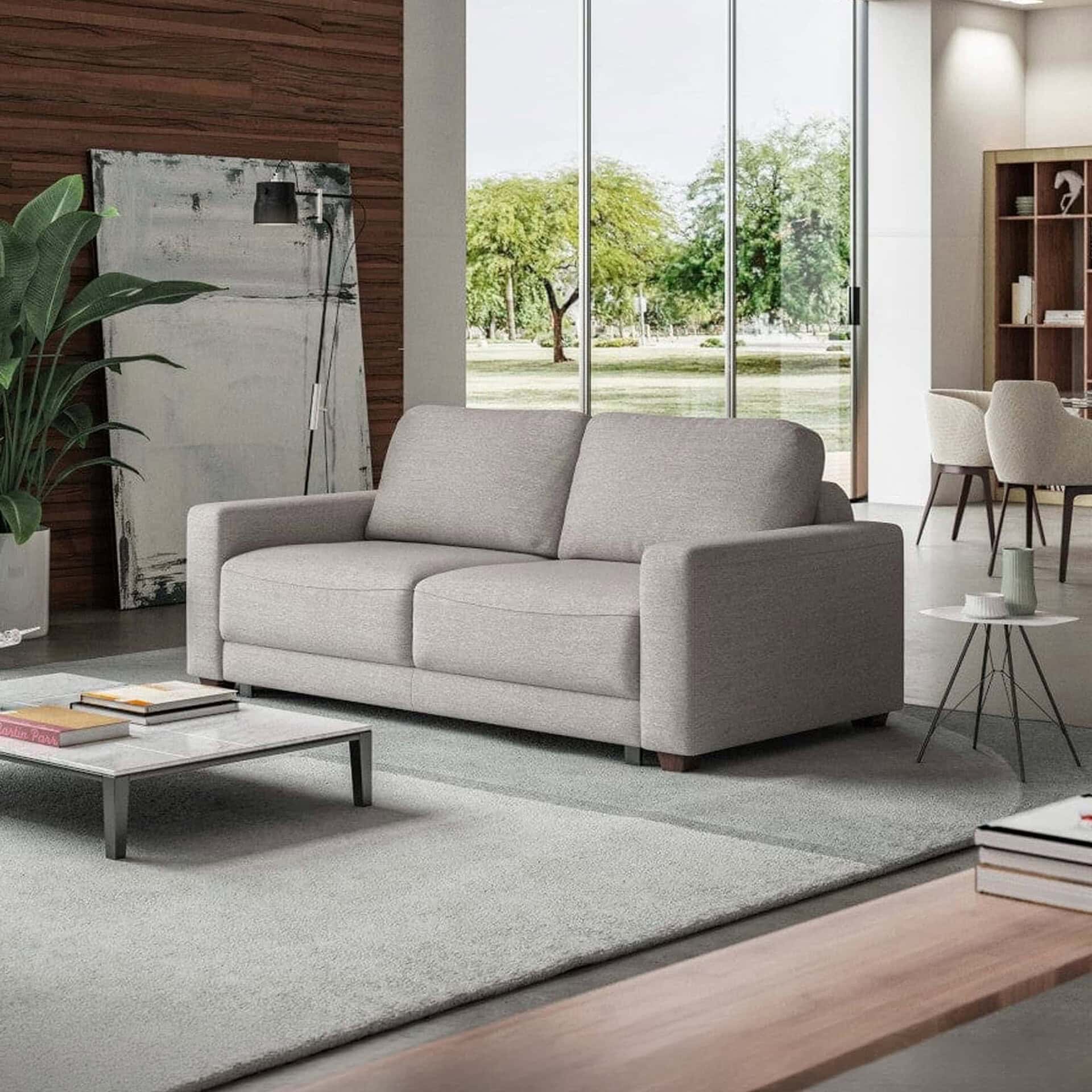 Comfortable Belton Queen Size Sleeper Loveseat in modern living room setting.