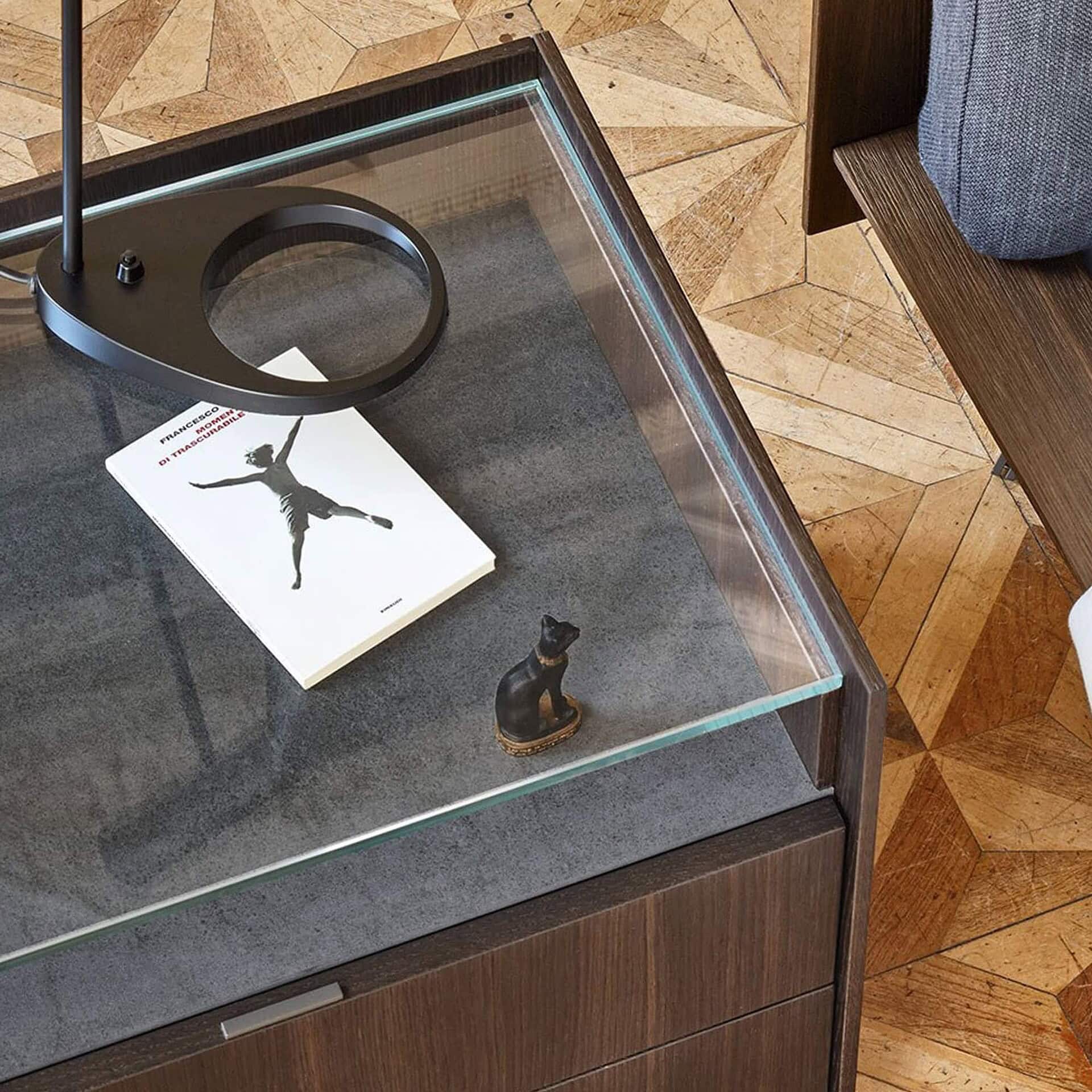 Close-up of San Giacomo Cabaret Glass Nightstand with glass top and fine craftsmanship details