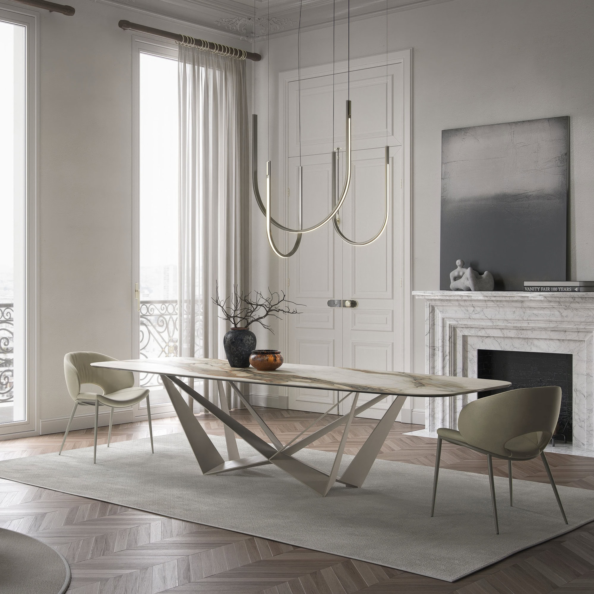 Skorpio Keramik dining table styled in a bright contemporary interior with glass windows.