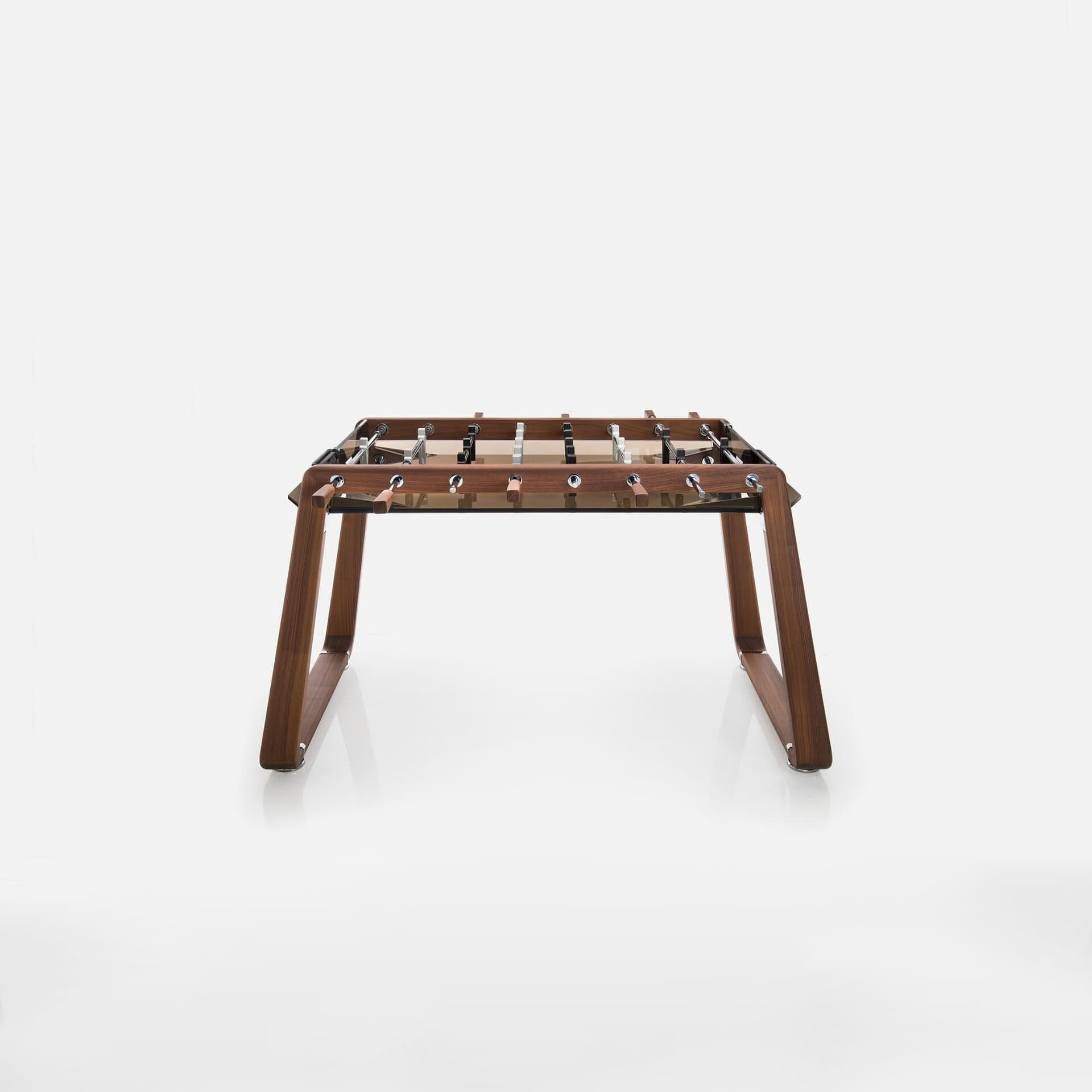 Modern wooden foosball table for family game rooms and entertainment spaces.