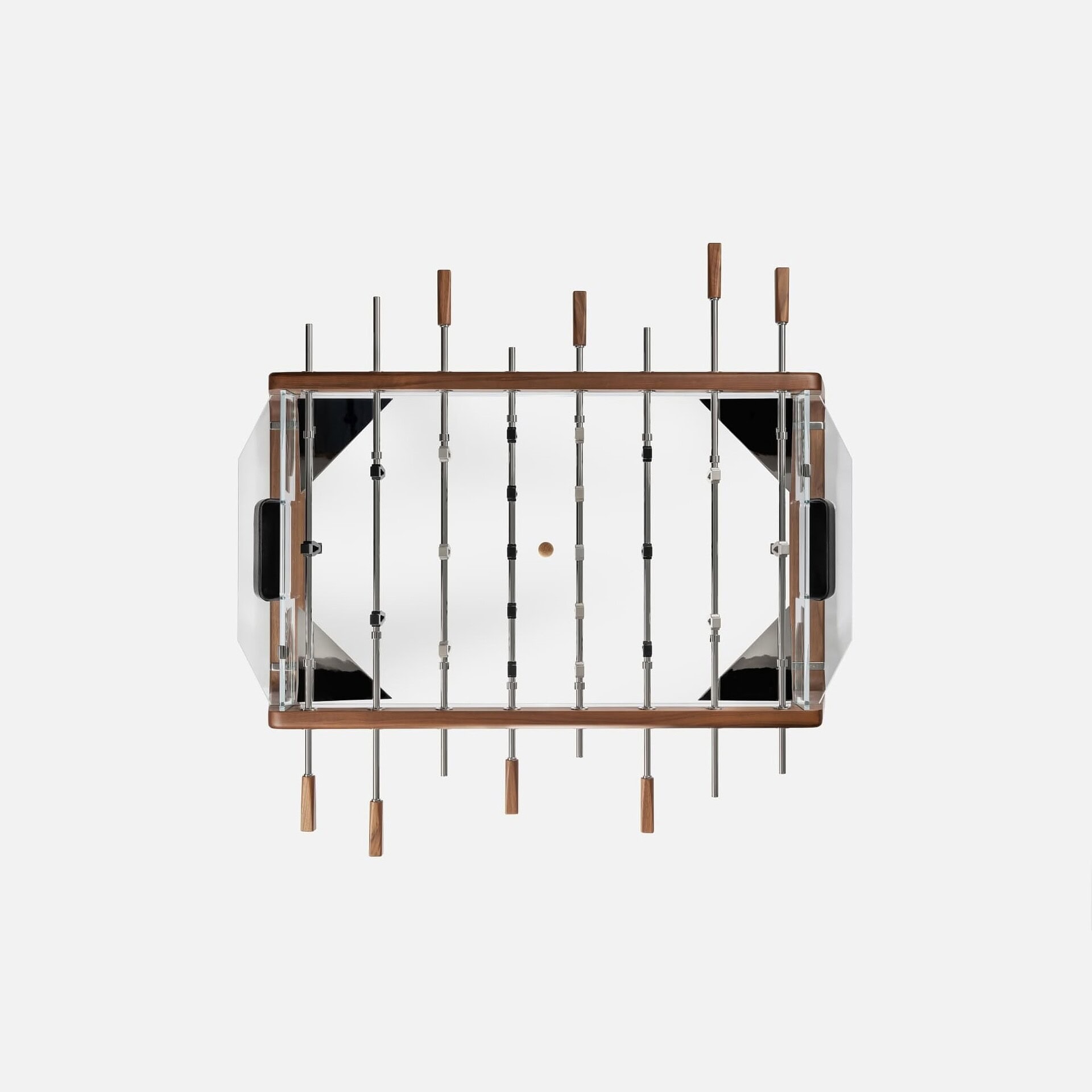 Sleek modern foosball table with wood and metal accents, perfect for game rooms and entertainment spaces.