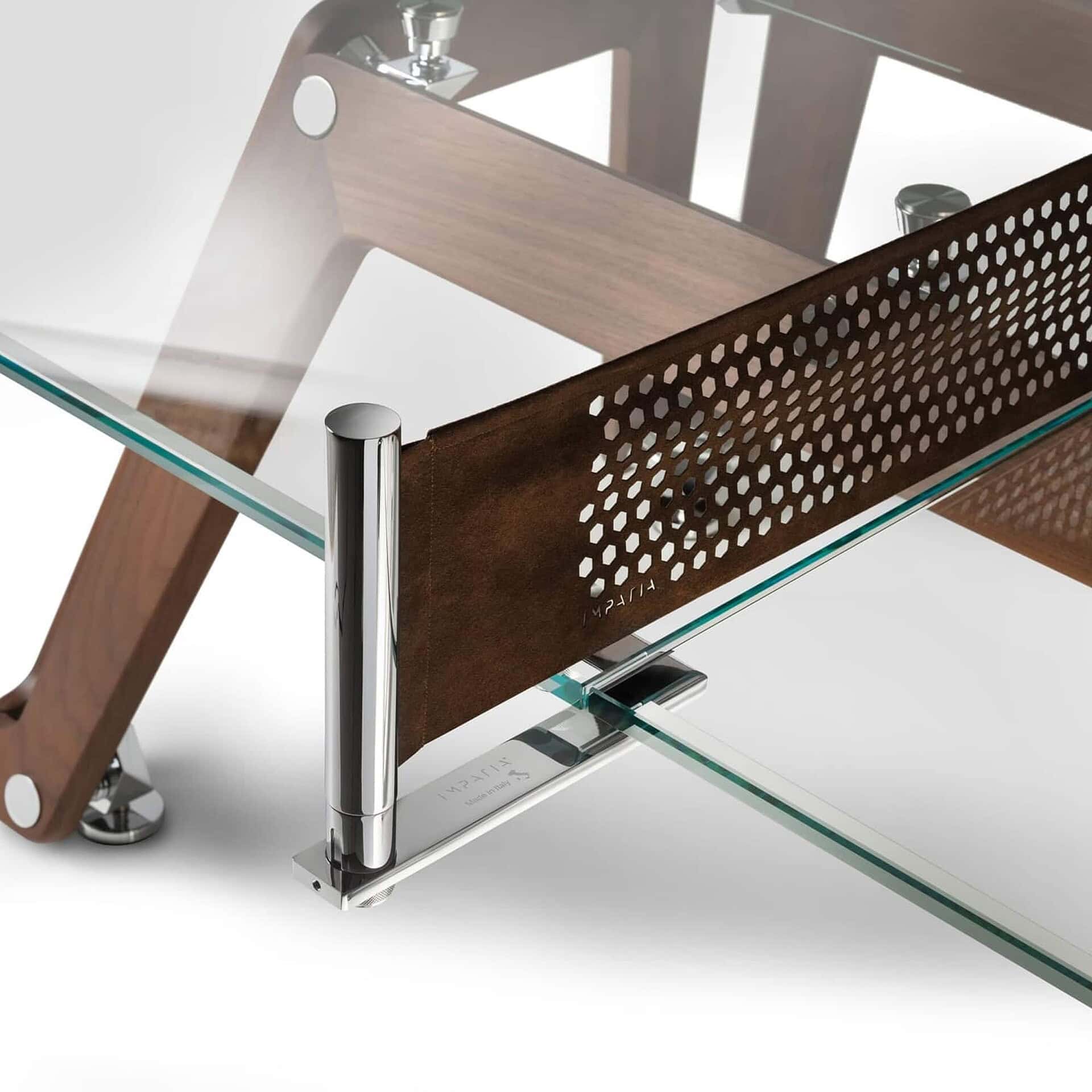 Sleek glass and wood dining table with metal accents, modern design by Sklar Furnishings.