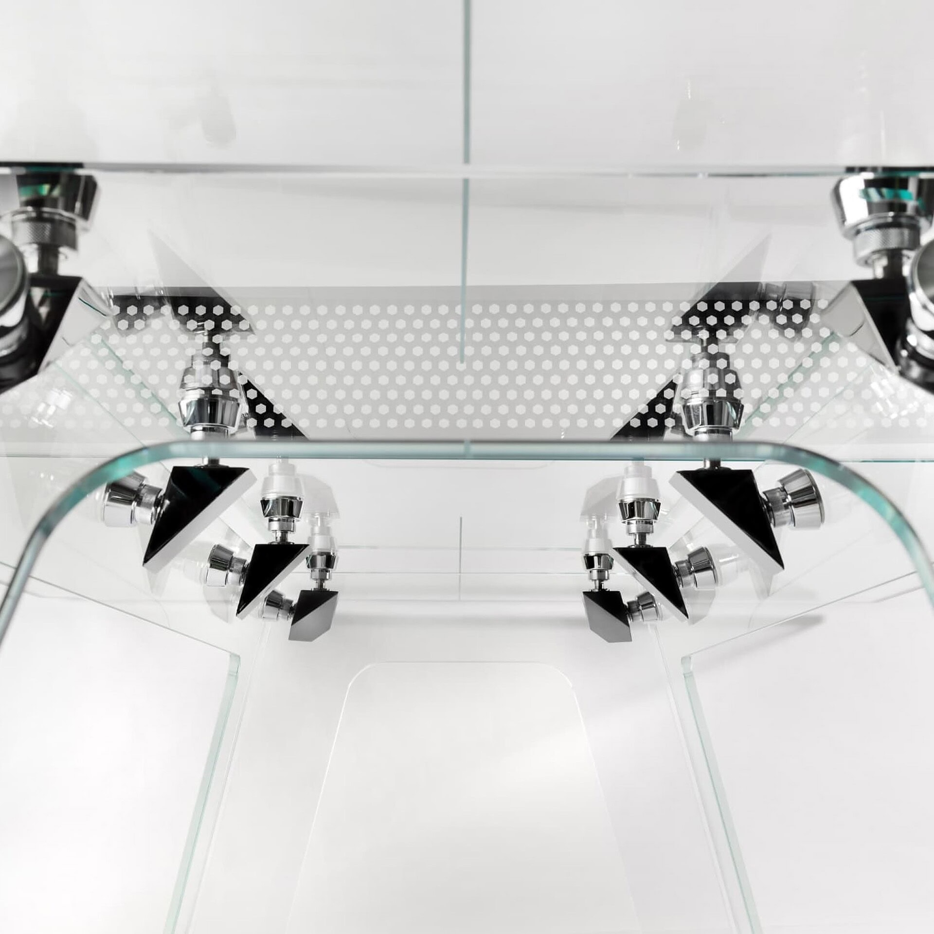 High-end glass table with modern lighting fixtures, sleek design for contemporary interiors.