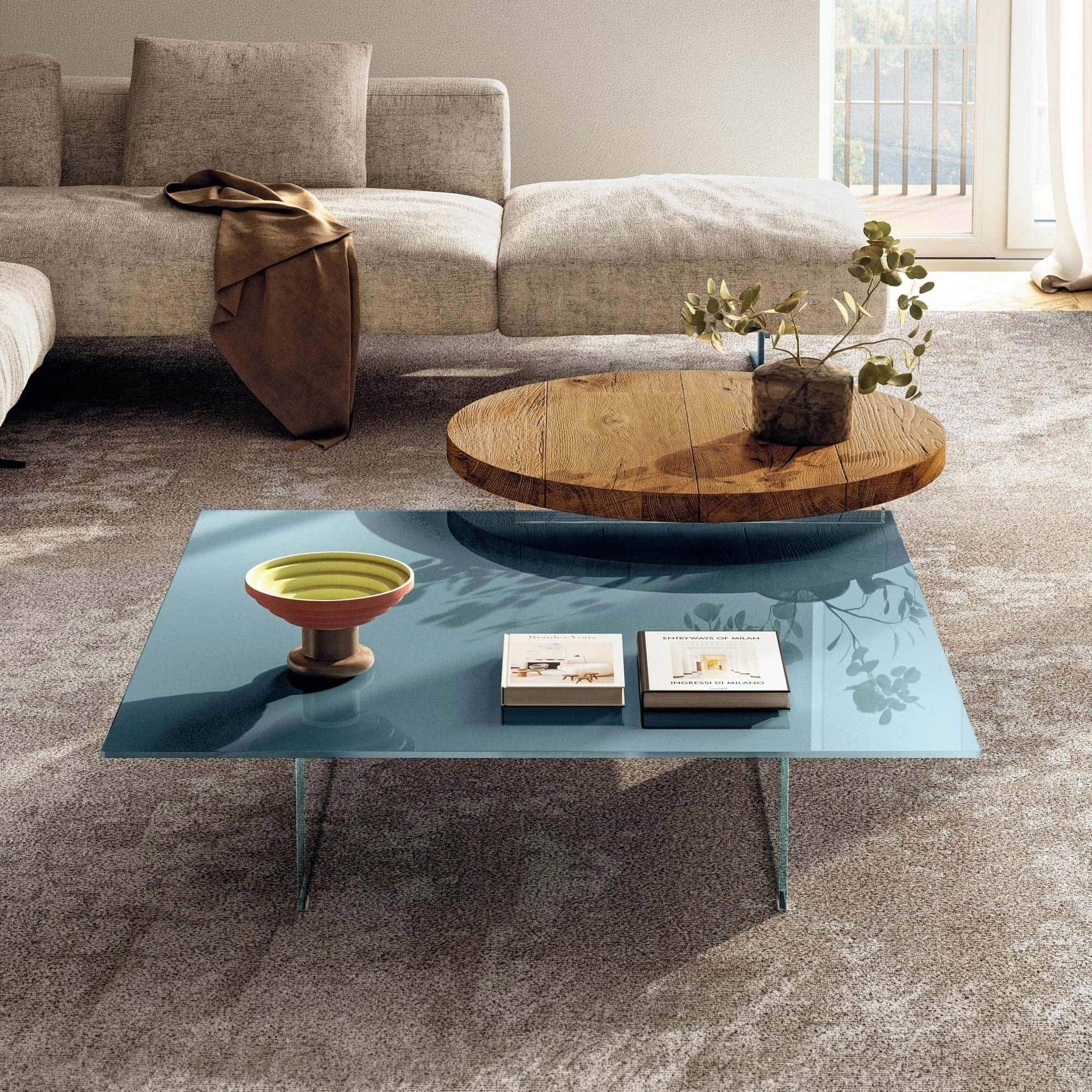 Modern air floating coffee table with a sleek blue glass top and minimalist design.