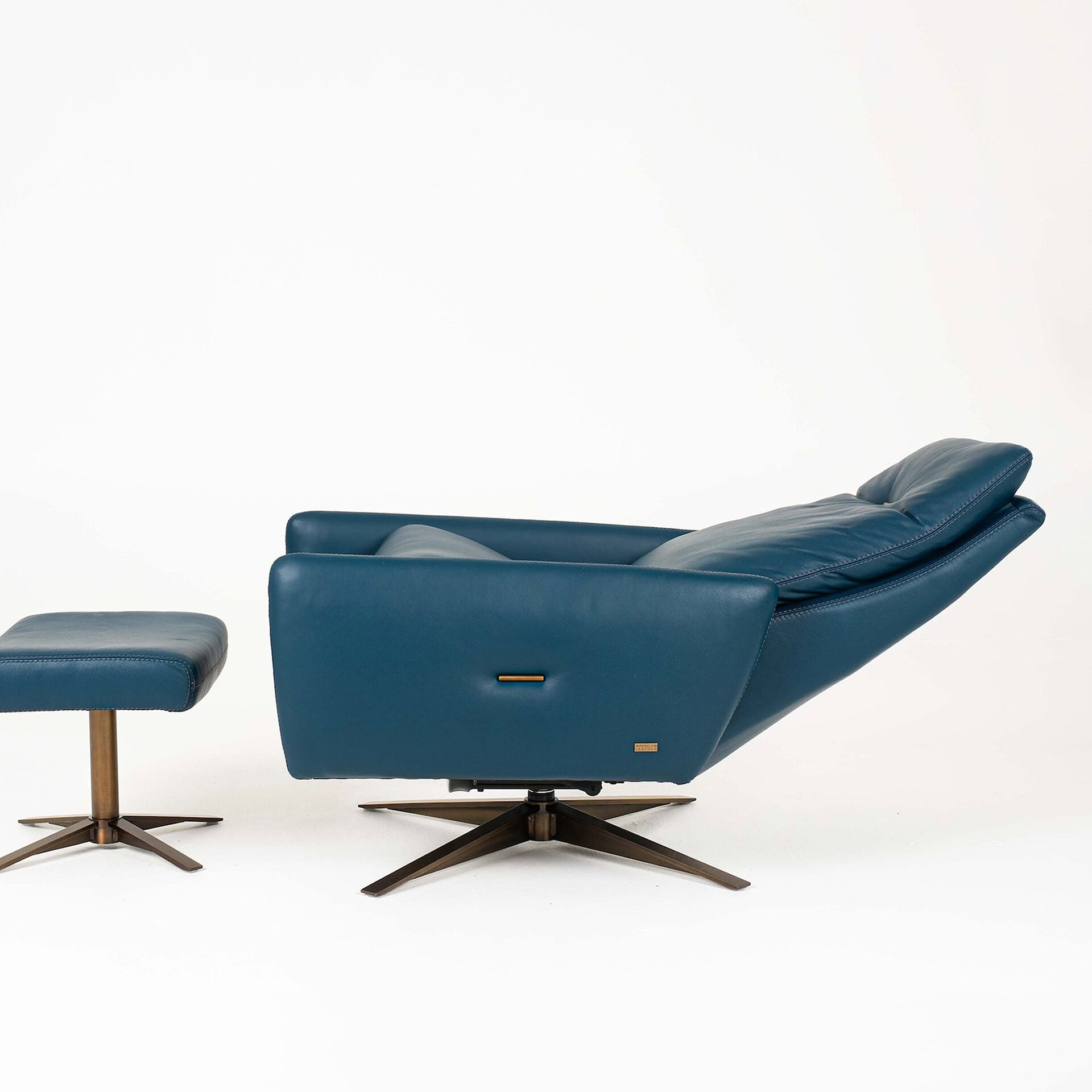 Blue Denali Comfort Air Recliner with matching ottoman for luxurious relaxation.