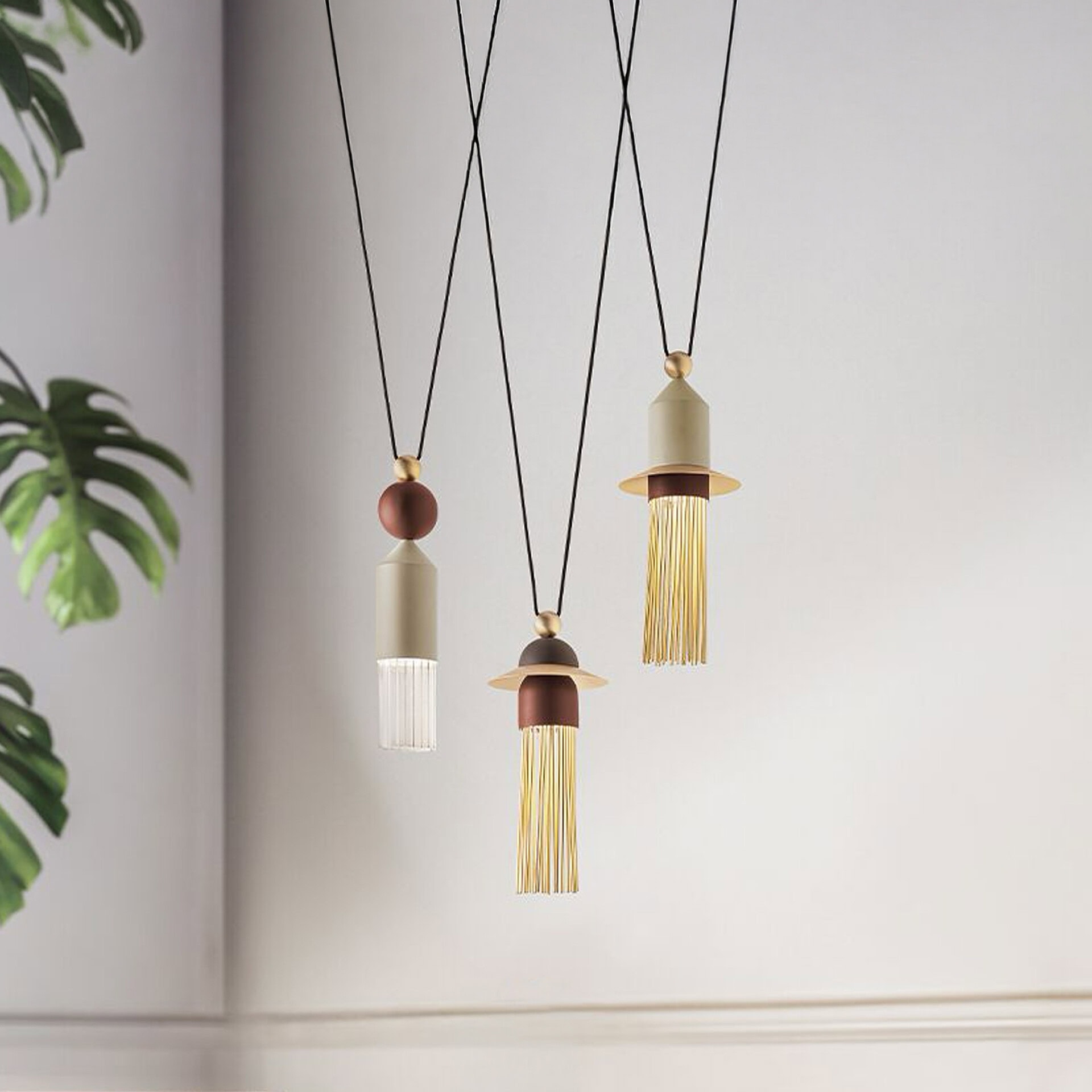 Pendant light fixture with tassel design for modern interiors.