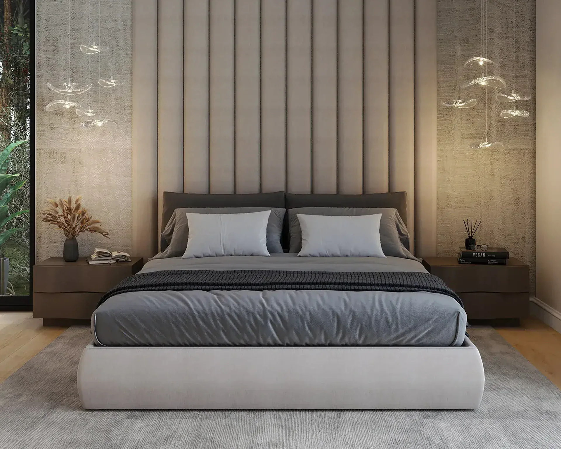 A modern bedroom with a gray bed, channel-tufted headboard, minimalist decor, and pendant lights.