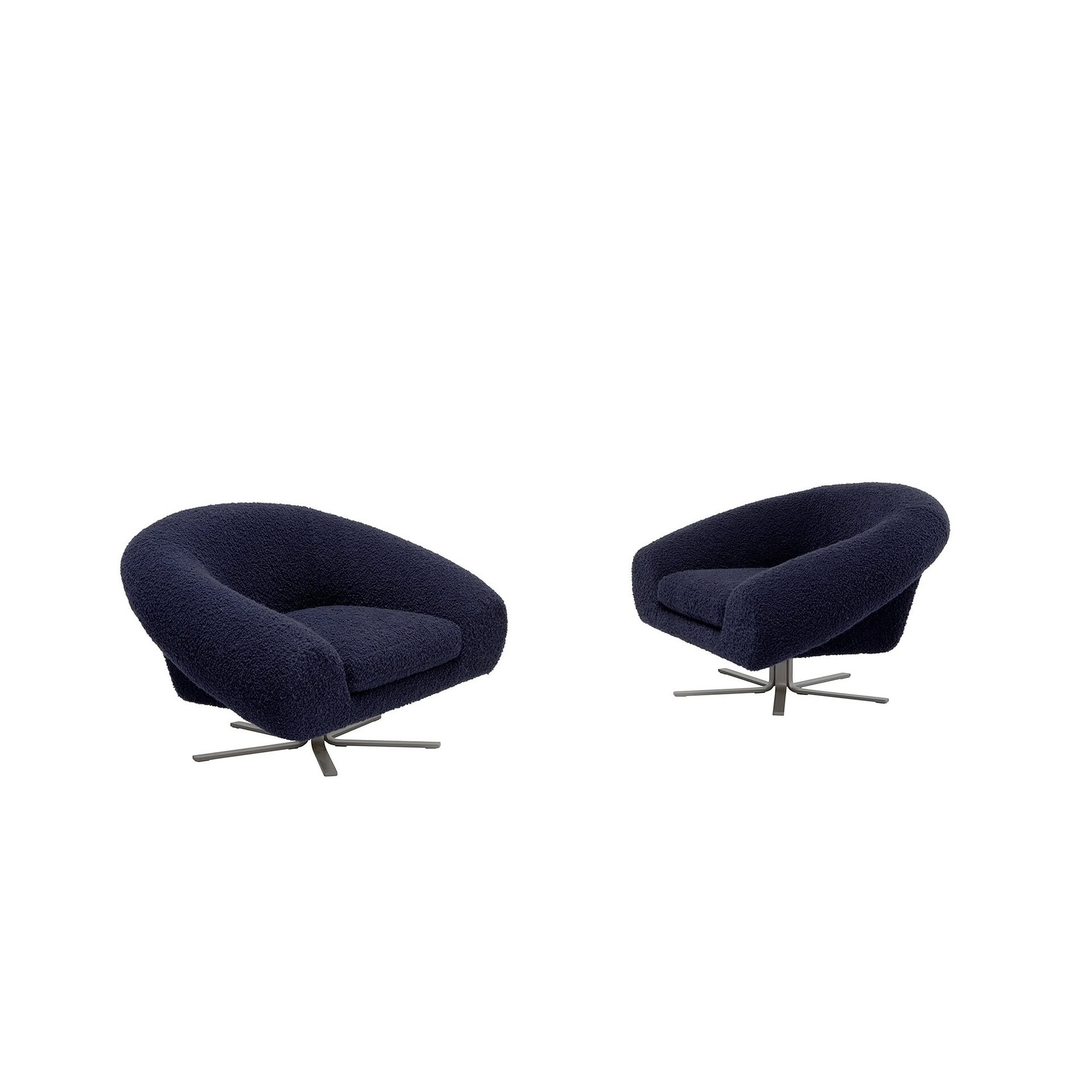 Two Airstrike Swivel Armchairs in dark navy upholstery side by side on white background.
