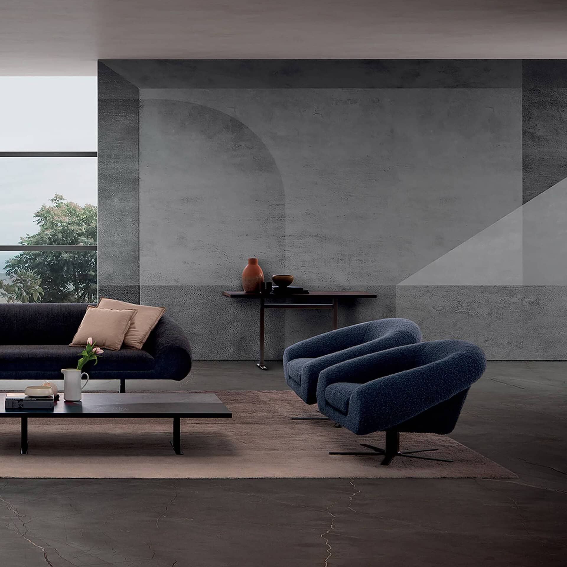 Airstrike Swivel Armchair in navy blue displayed in a spacious industrial-style room.