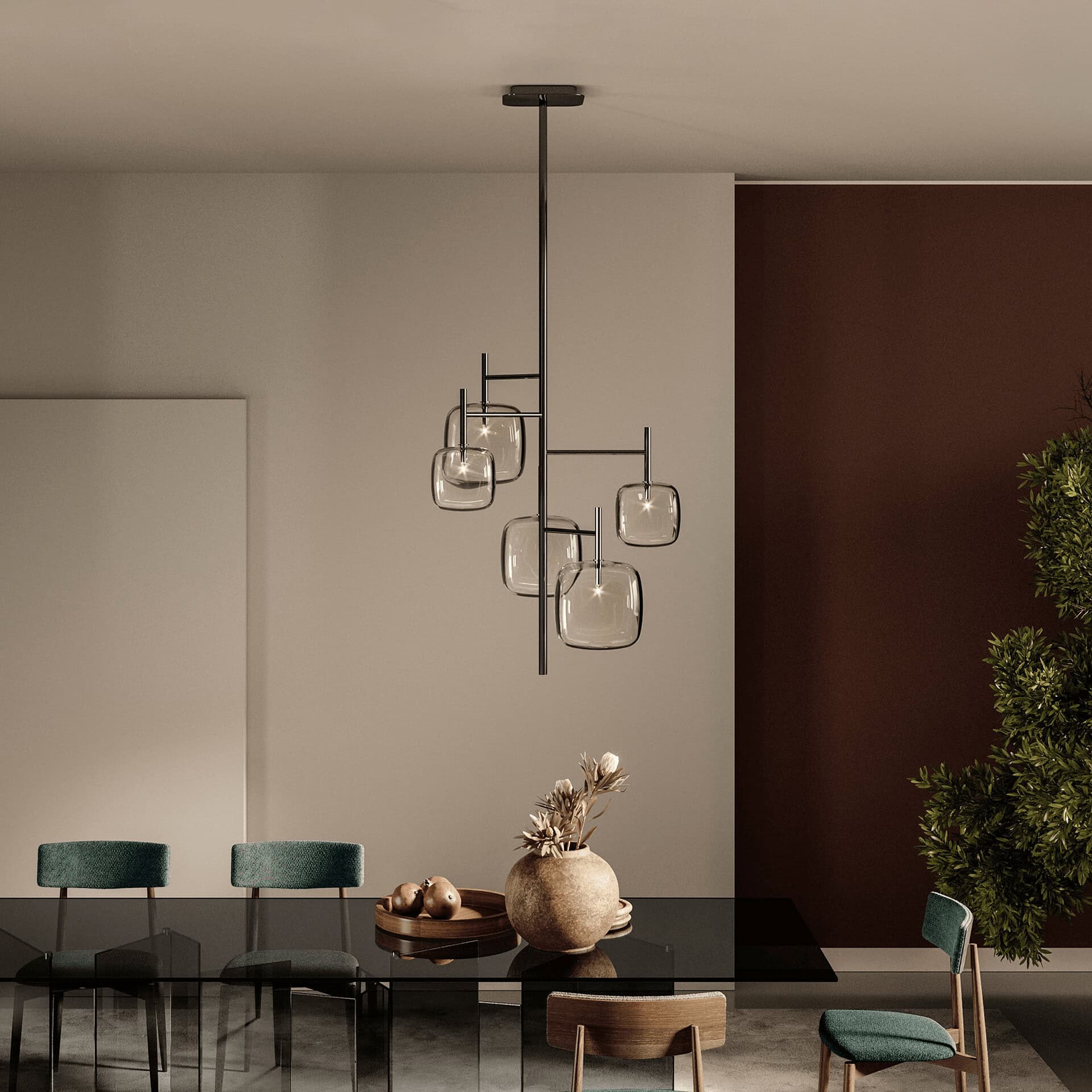 A modern dining room with a unique multi-shade chandelier, a glossy black dining table with teal chairs, and contrasting beige and dark brown walls.