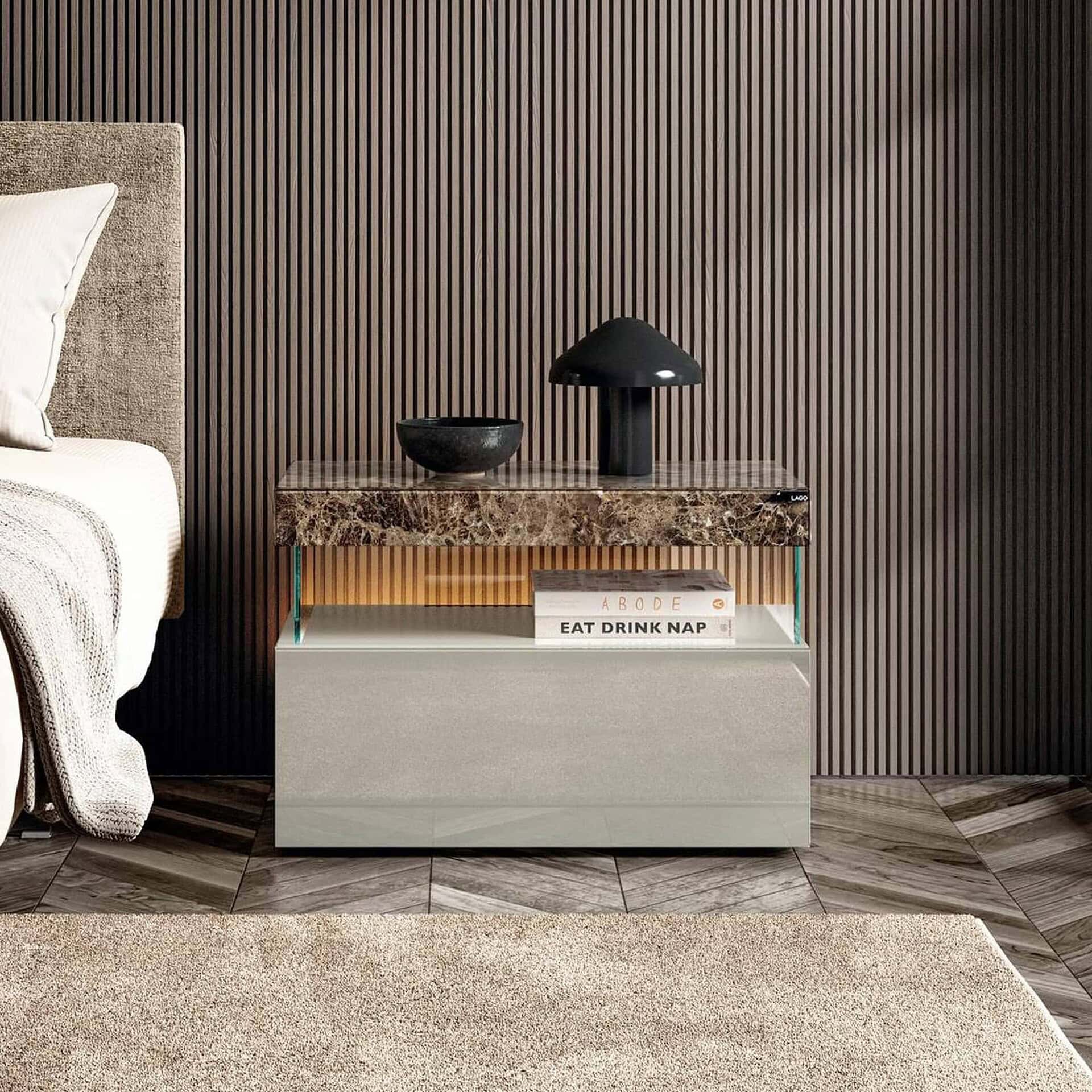 Air Floating Glass Nightstand in grey finish with transparent supports styled with books and decor.