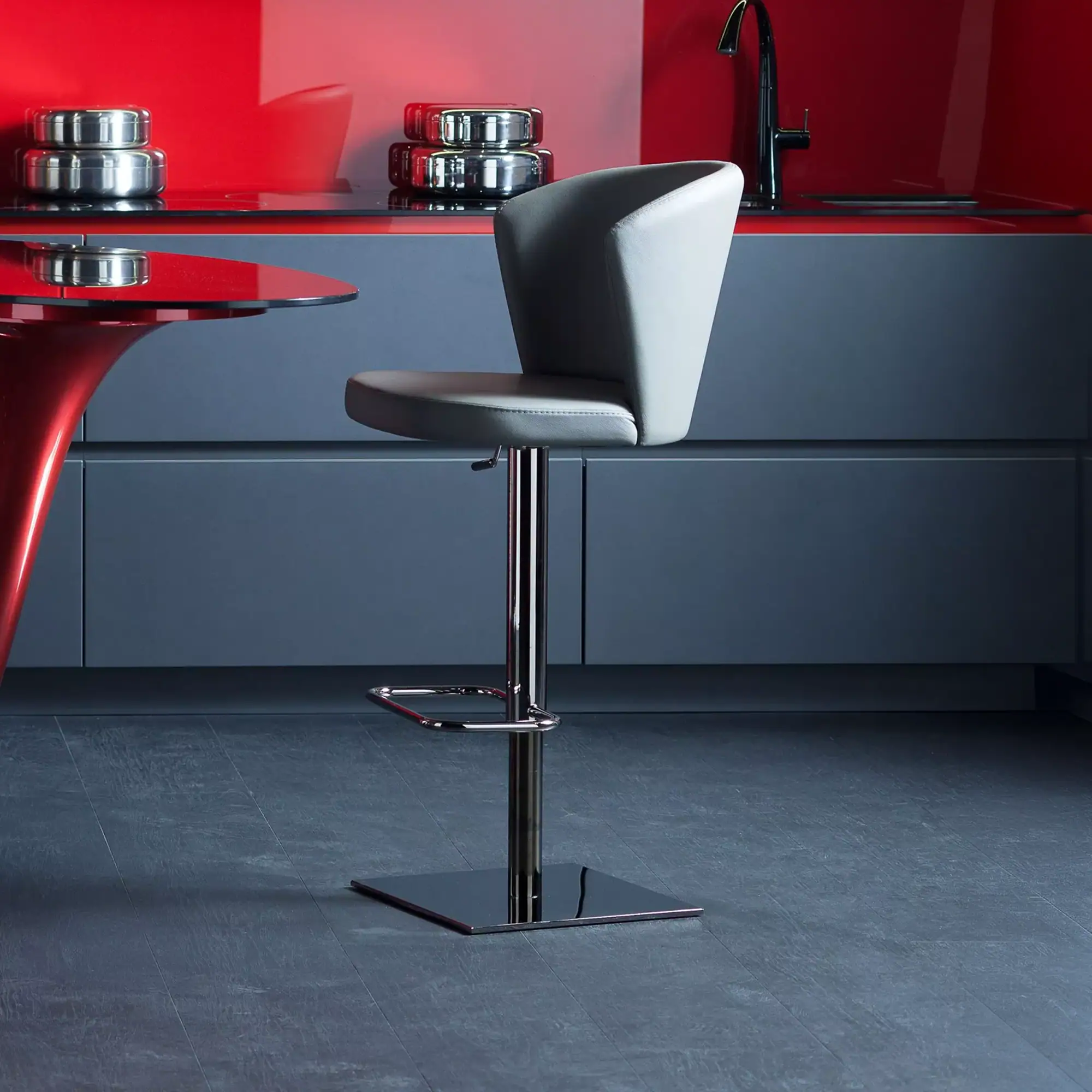 Sklar Furnishings Ines adjustable bar stool in modern kitchen setting.