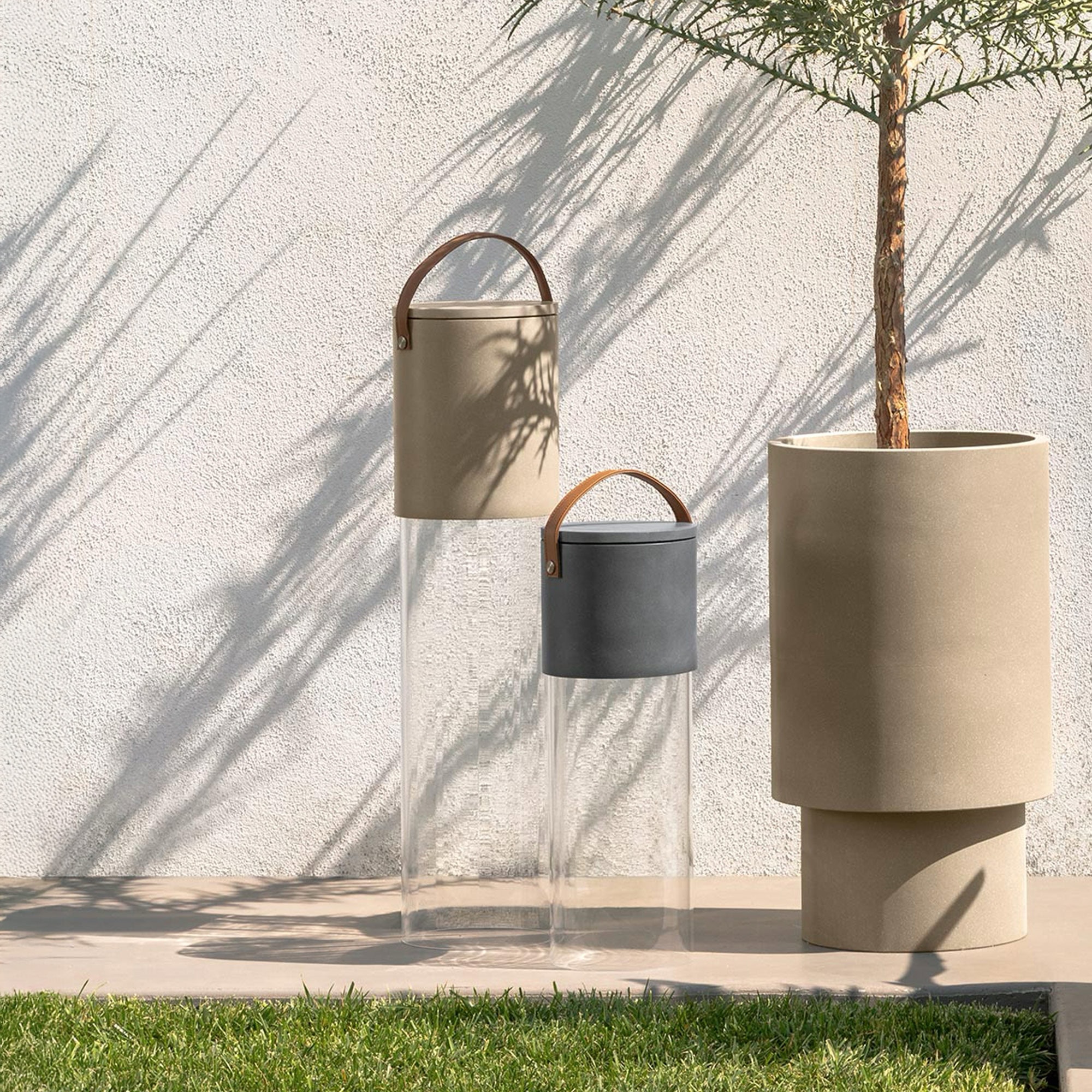 Stylish outdoor planters with potted trees for modern garden decor.