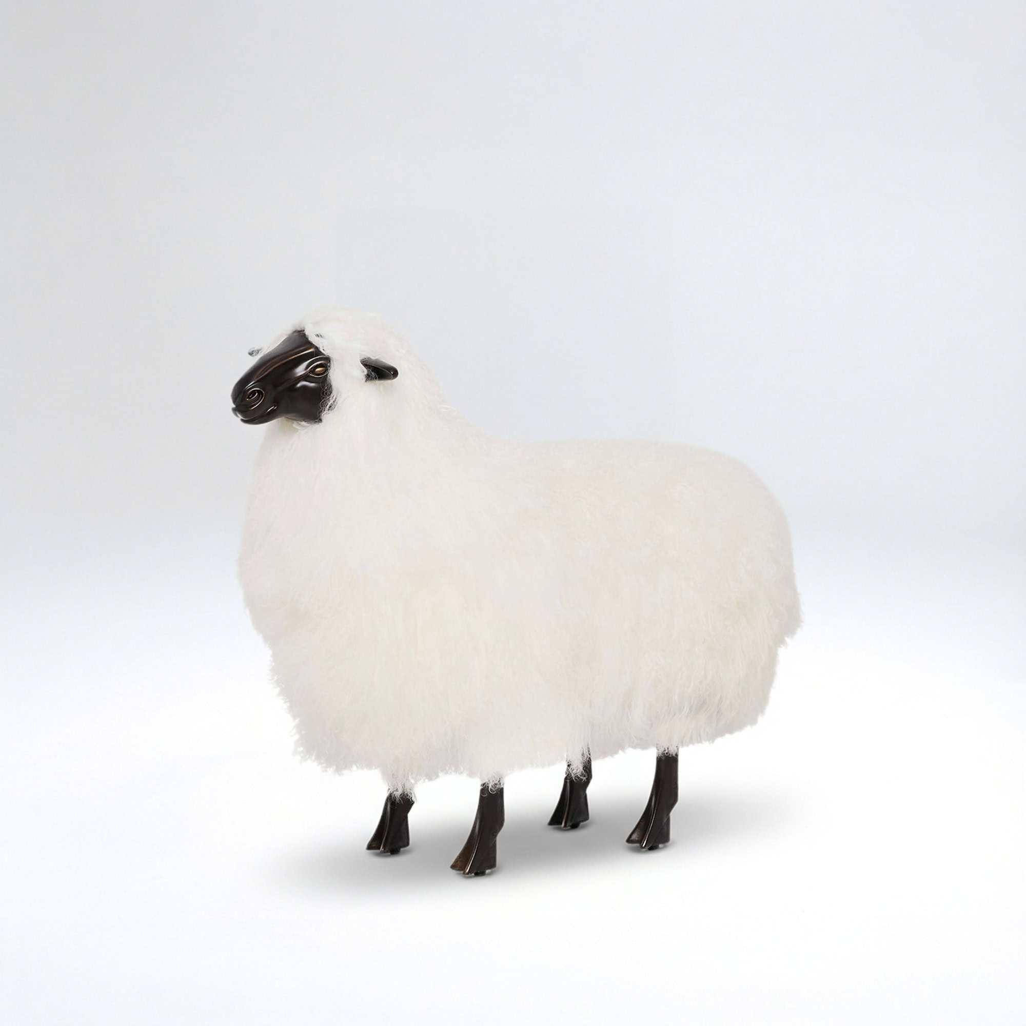 Sheep plush chair with soft, fluffy white fabric and dark wooden legs, perfect for a cozy and stylis.