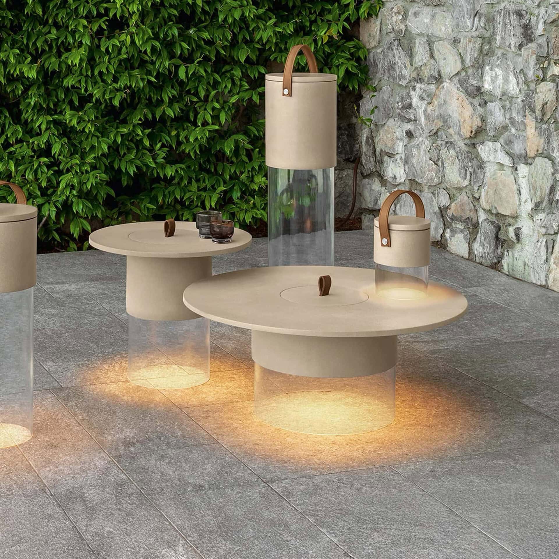 Stylish beige outdoor tables with integrated lighting and unique design. Perfect for garden or patio.