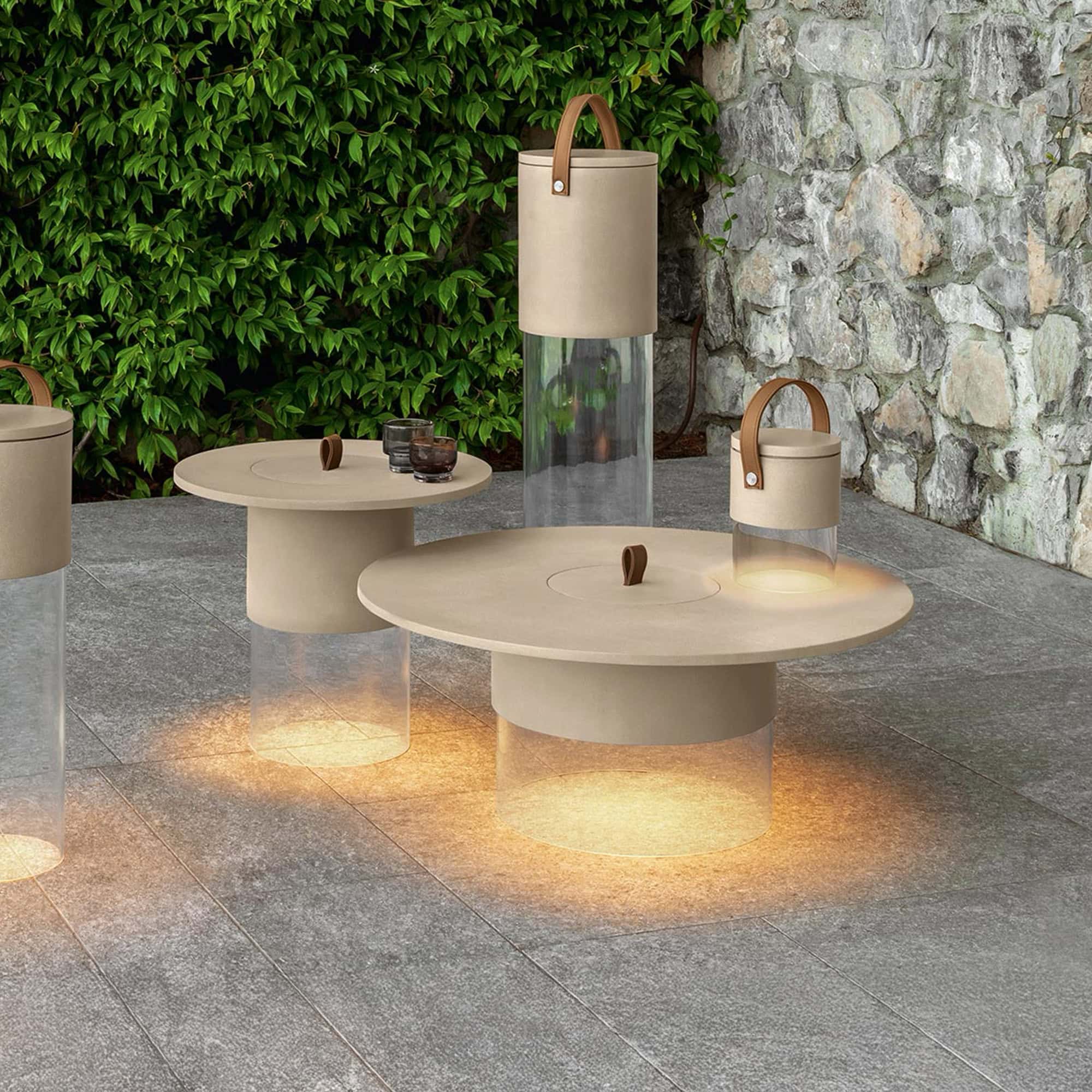 Stylish beige outdoor tables with integrated lighting and unique design. Perfect for garden or patio.