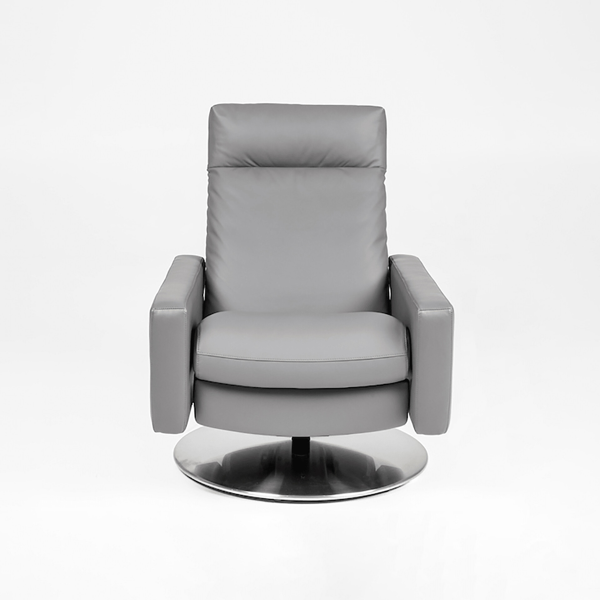A modern grey recliner chair with a high back and padded armrests, sitting on a round, polished metal swivel base against a white background.