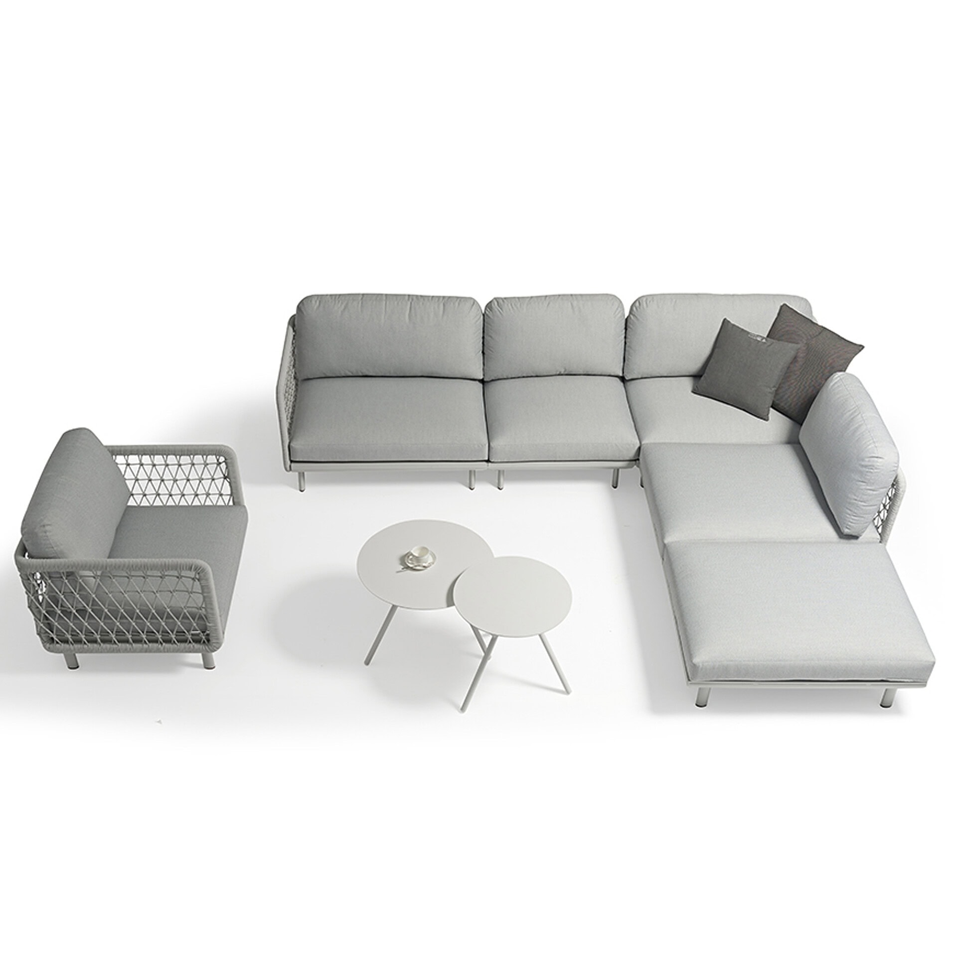 Modern gray outdoor sofa set with matching armchair and coffee tables.