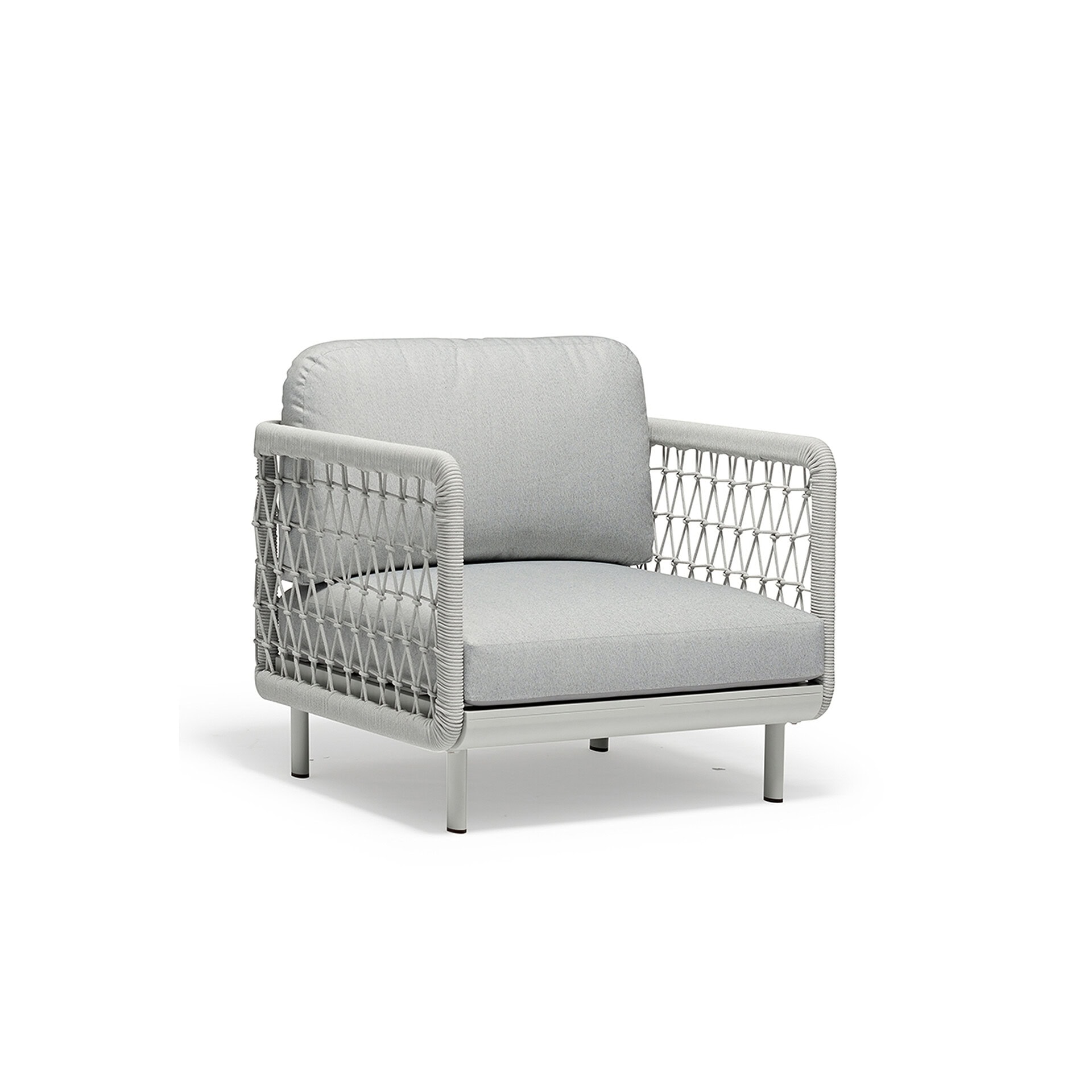 Outdoor lounge chair with woven frame and plush cushions.