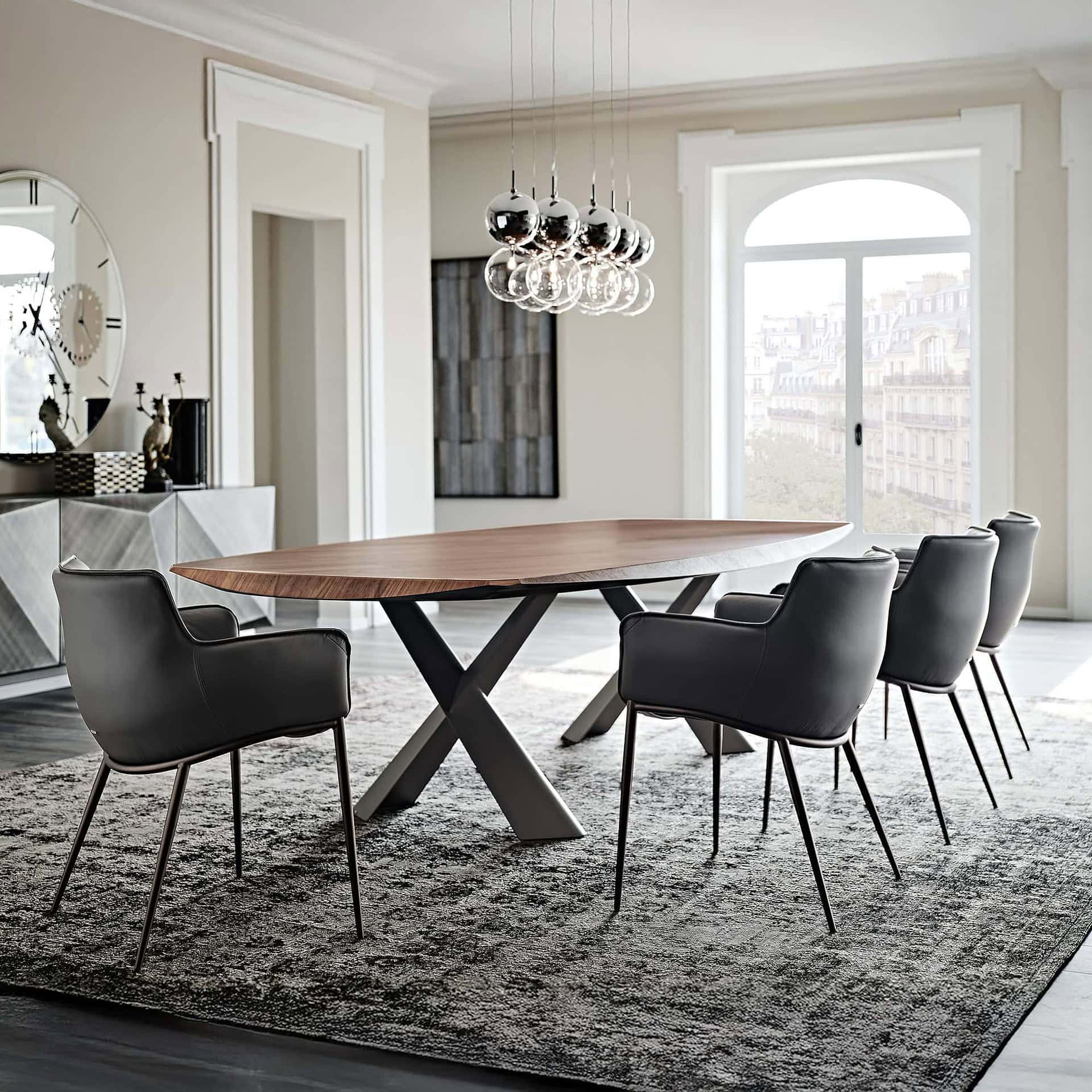 Elegant dining room with multiple Rhonda Dining Chairs paired with a large wood dining table.