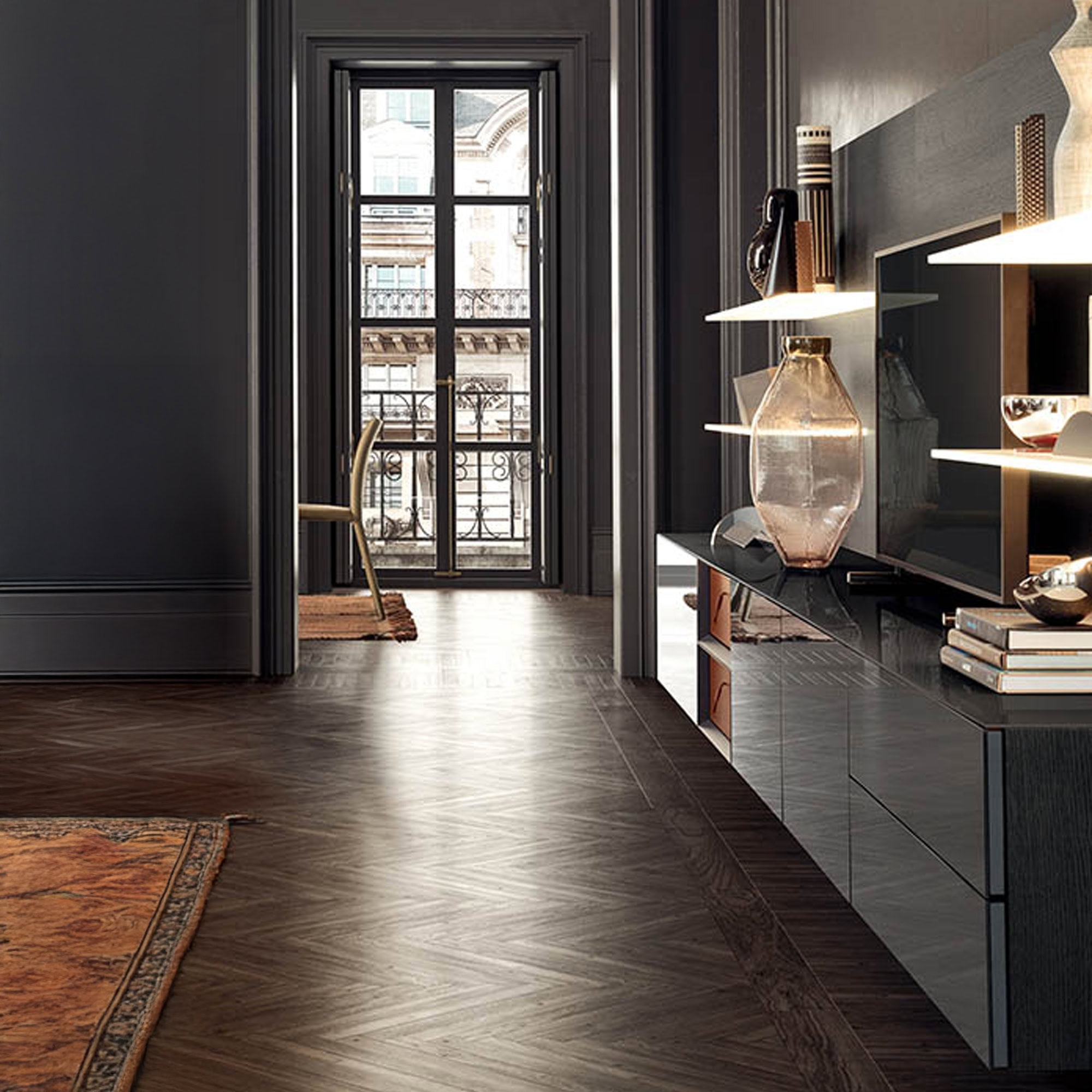 View of Spazio modular wall unit along hallway with illuminated shelving and matte finishes.