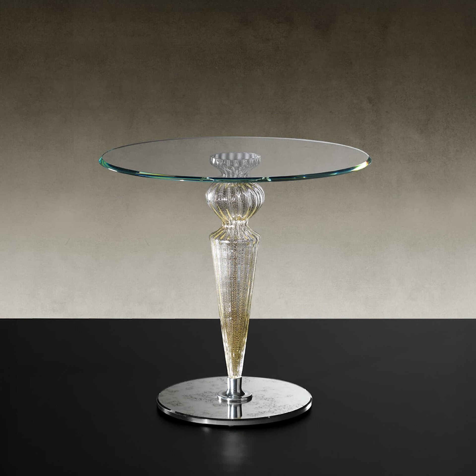 Gran Canal 55 Side Table with Murano glass leg and round beveled glass top, styled in a modern interior.
