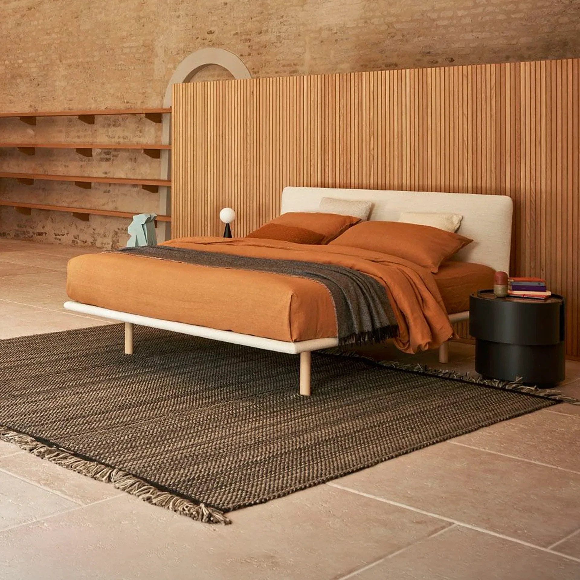 Elegant Filo upholstered platform bed with modern design. Perfect for contemporary bedrooms and styl.