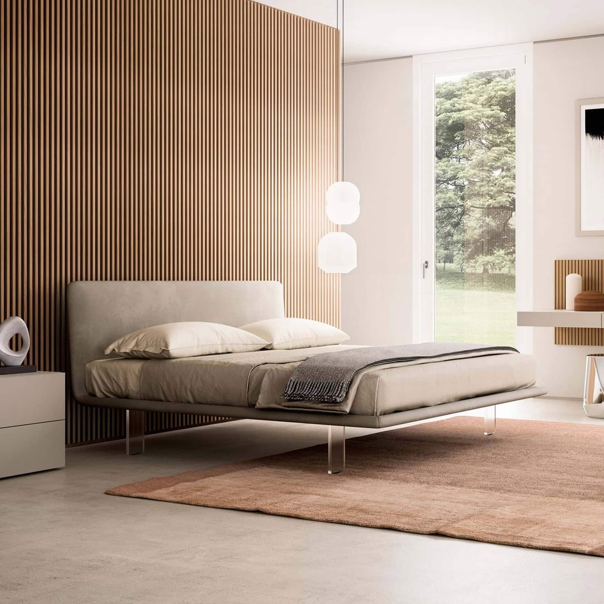 Elegant Filo upholstered platform bed with modern design. Perfect for contemporary bedrooms and styl.