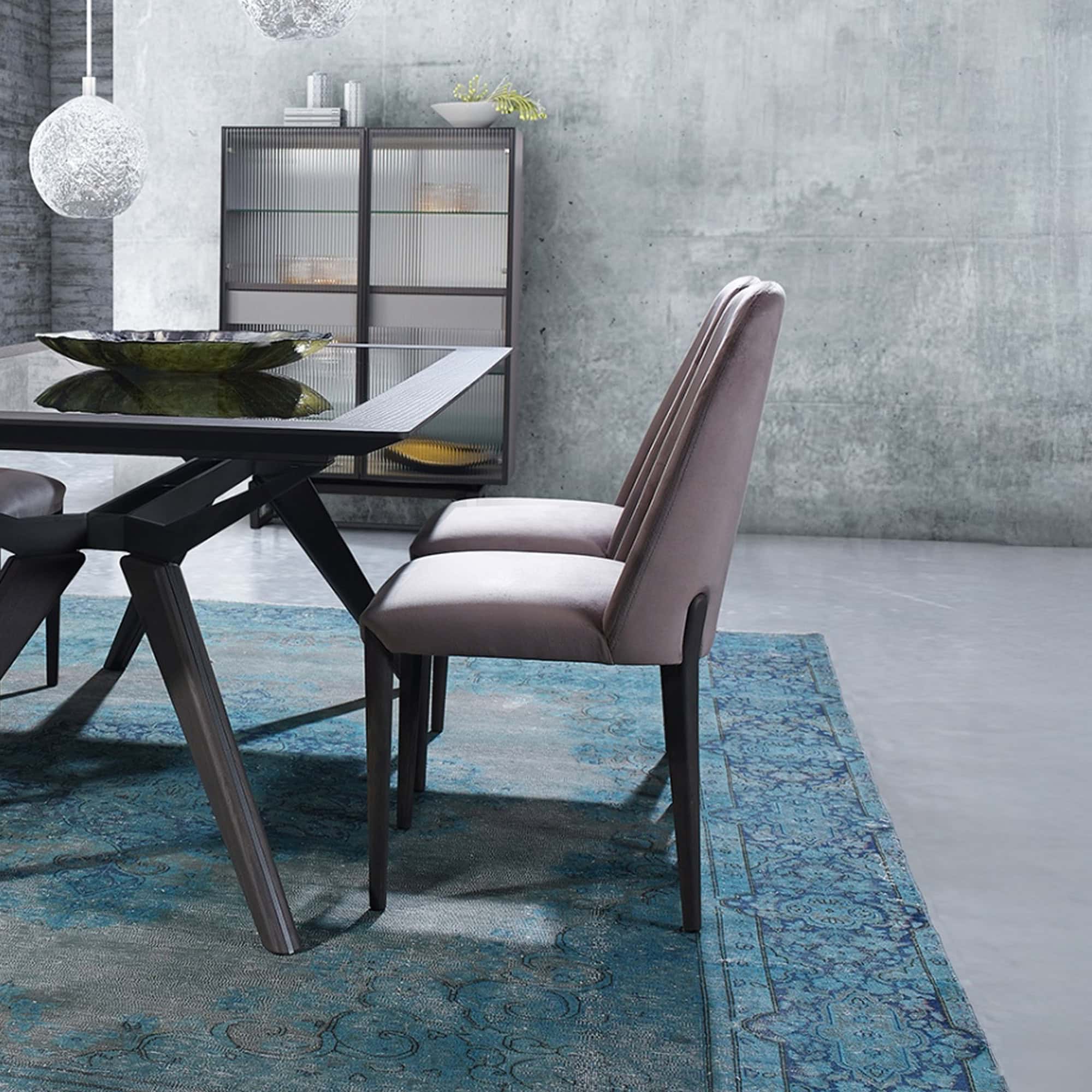 Allure Upholstered Dining Chair in brown fabric shown in modern dining room with wood table and rug.