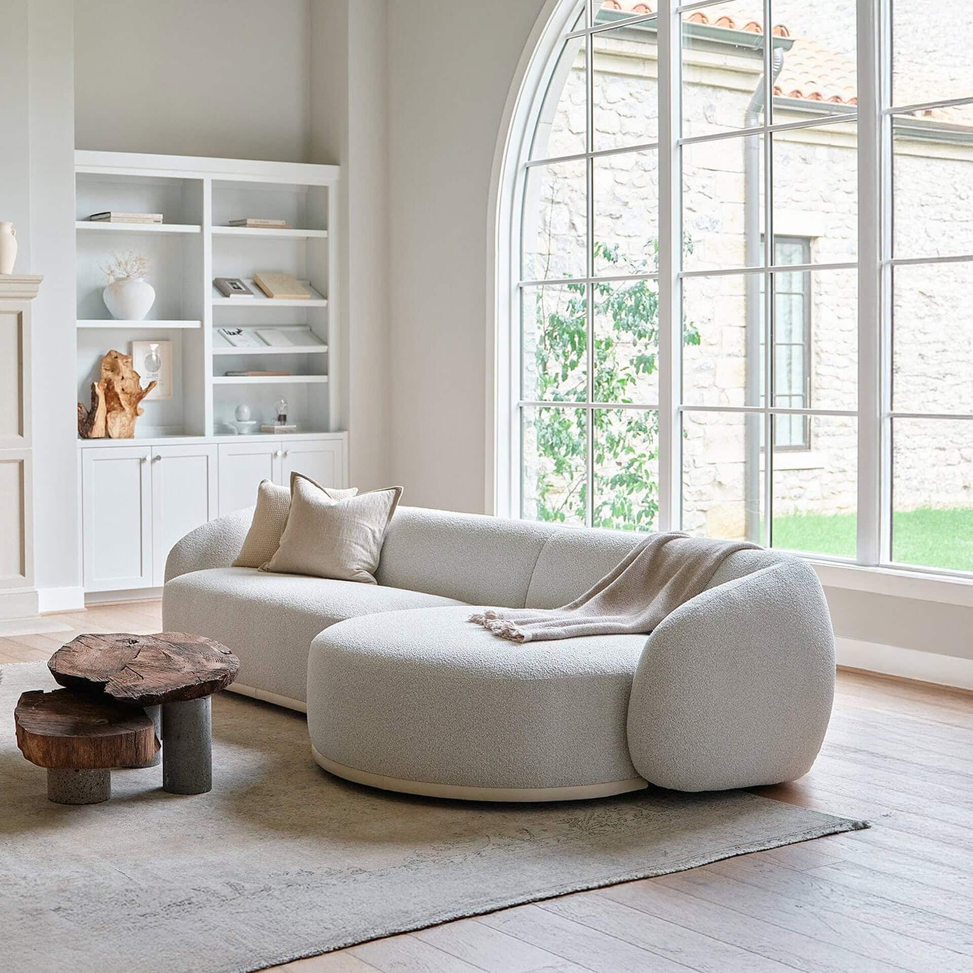 Athlea Sofa styled in a bright living room with natural light and neutral décor.