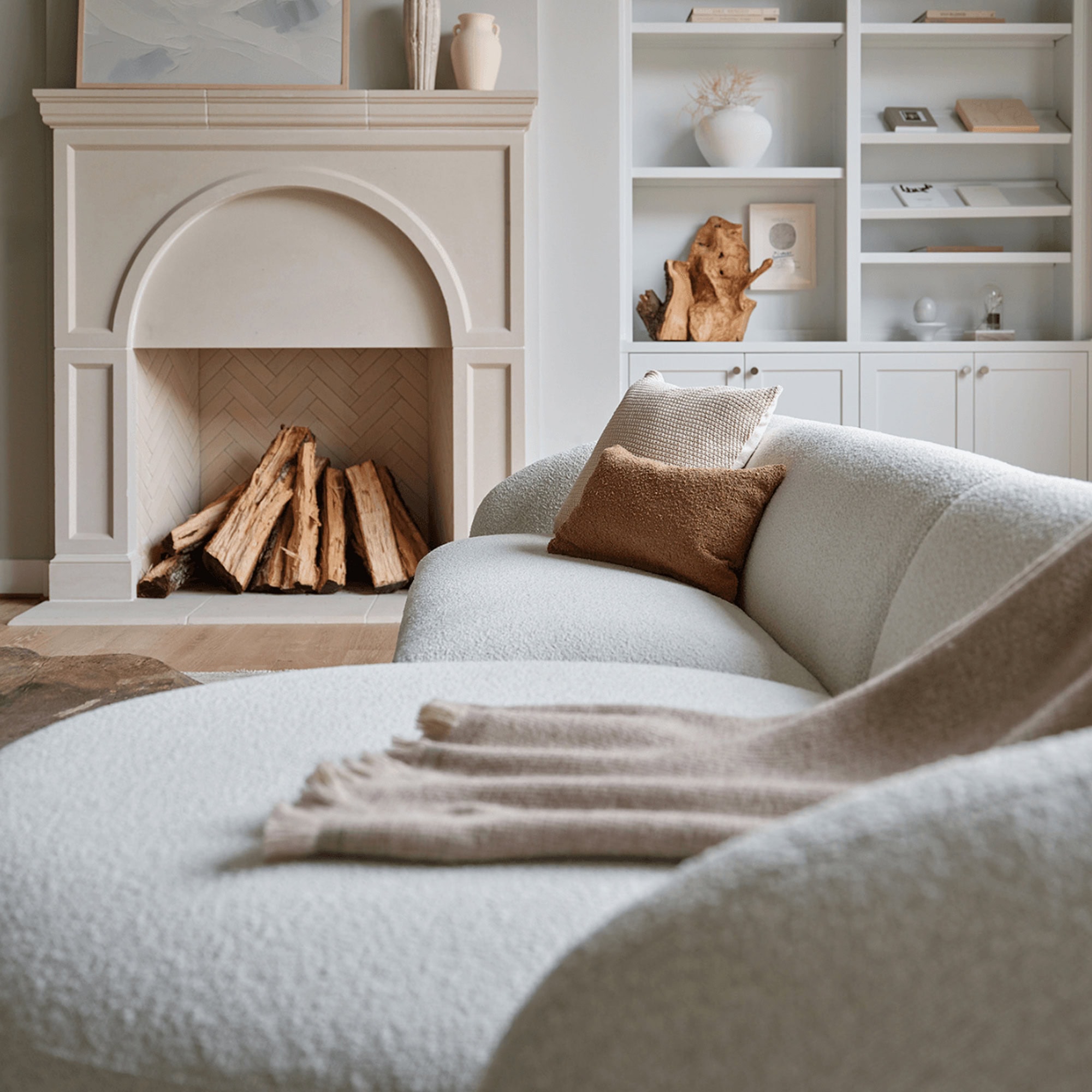 Close-up of the Athlea Sofa highlighting plush seating and fabric texture.