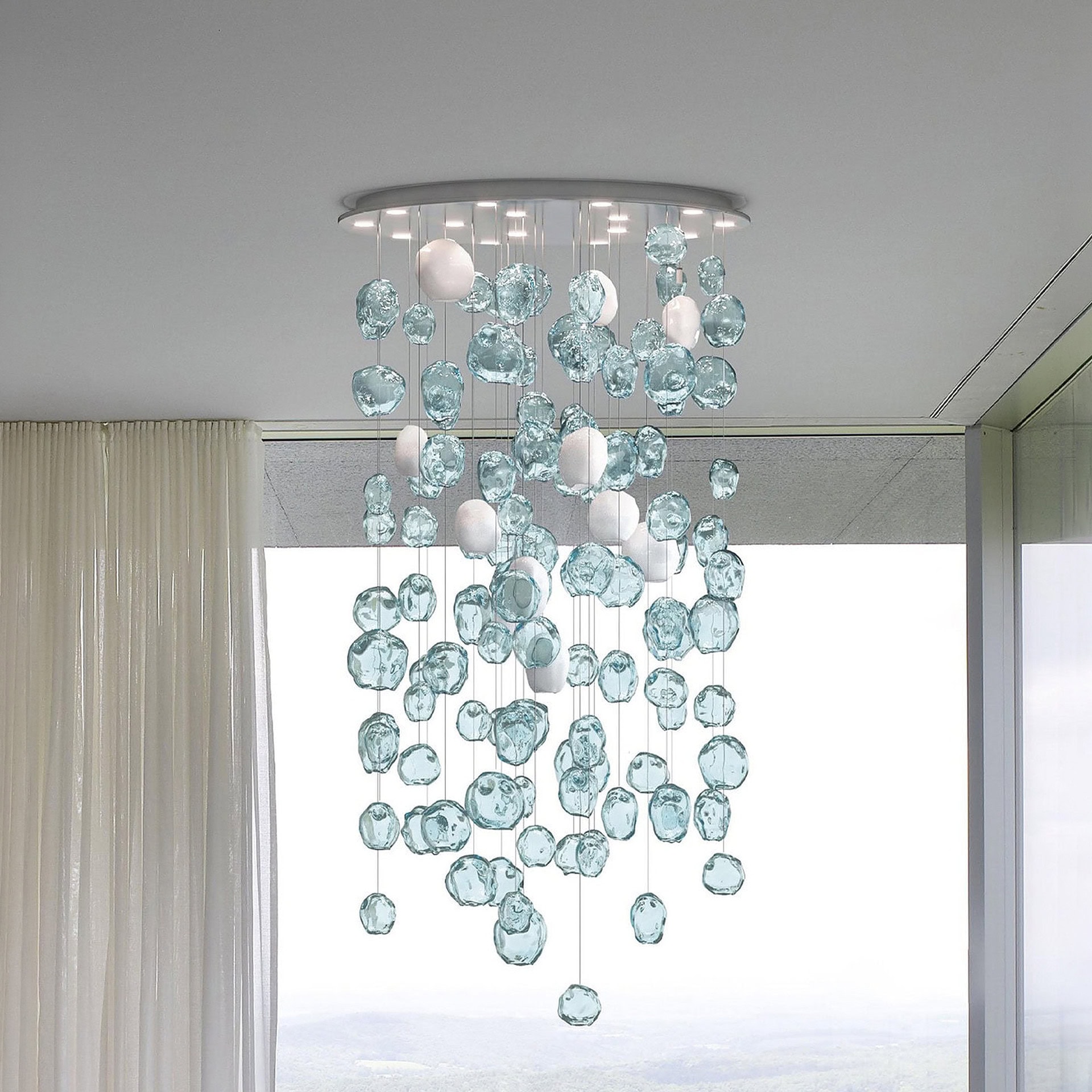 Elegant Hanami crystal chandelier with hanging glass orbs for modern interior decor.