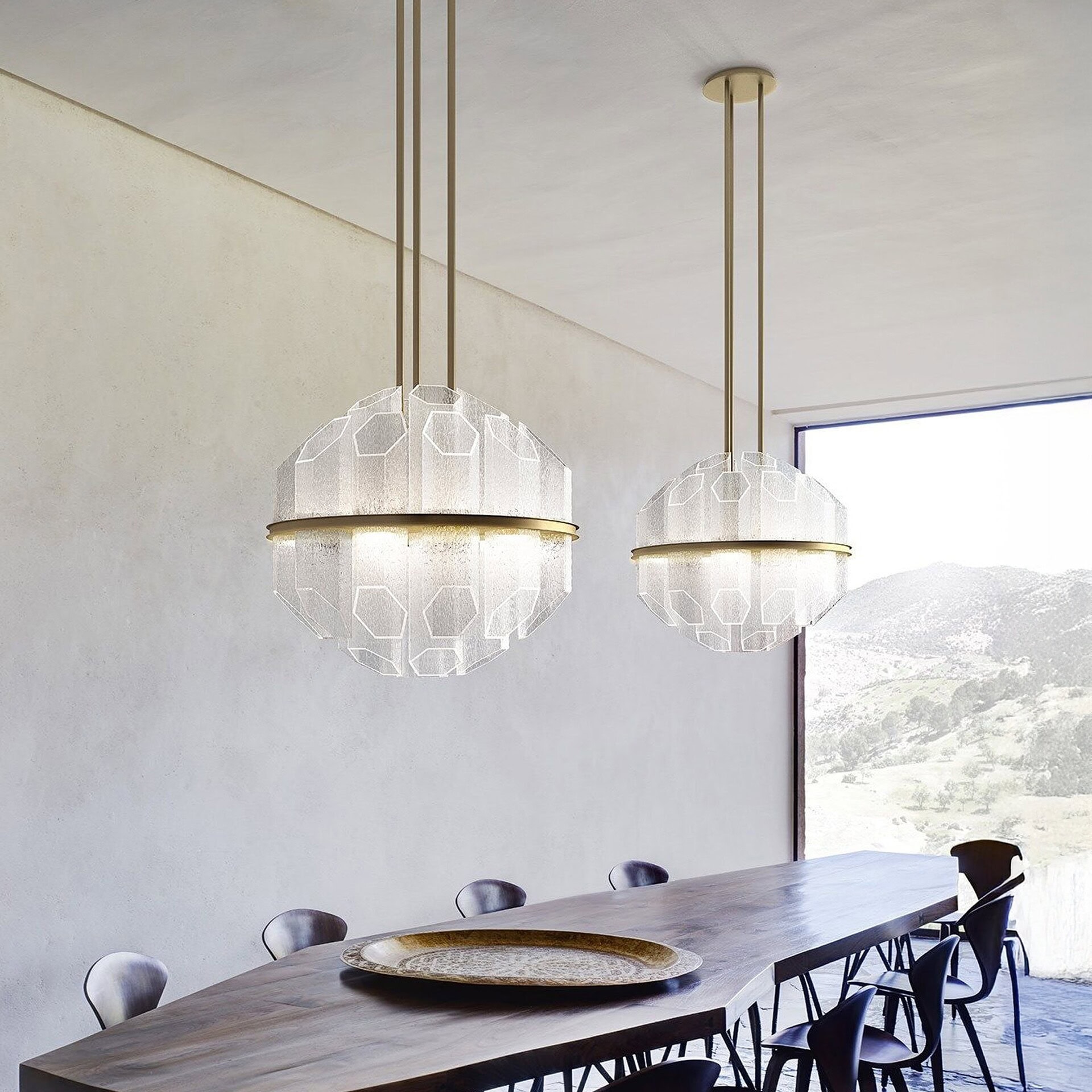 Trim Venetian Crystal Pendant Lights by Barovier&Toso installed over a dining table in a minimalist setting.