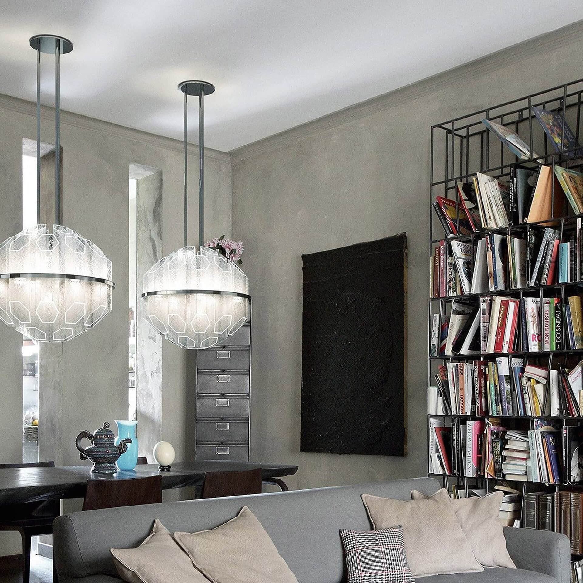 Pair of Trim Venetian Crystal Pendant Lights by Barovier&Toso above a contemporary sofa, Venetian crystal design.