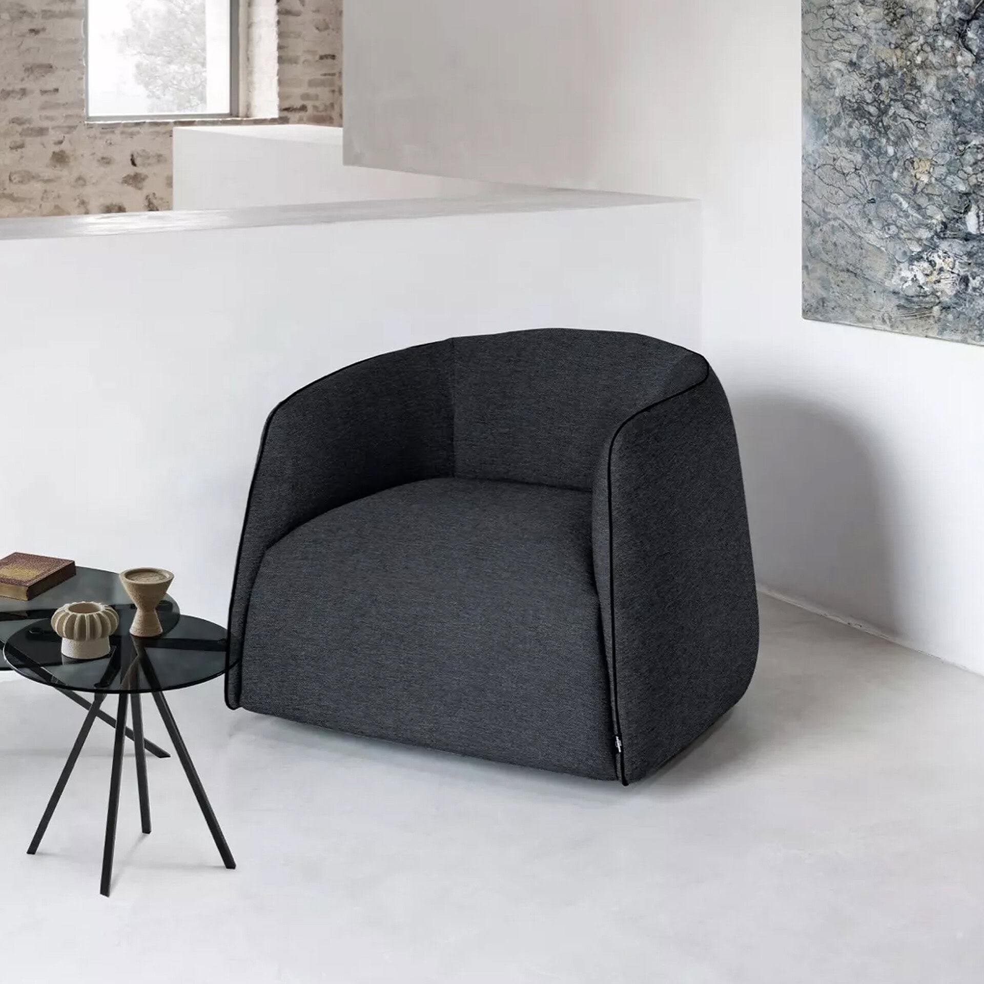 Comfortable and stylish grey lounge chair ideal for modern living spaces.