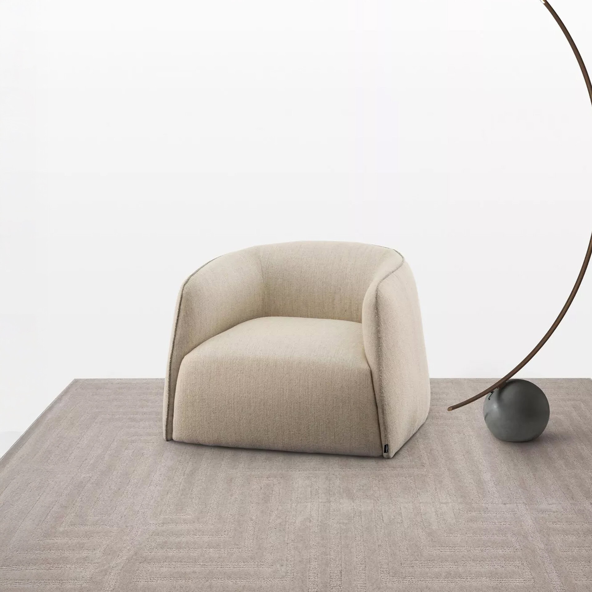 Comfortable beige modern armchair with sleek design by Sklar Furnishings.