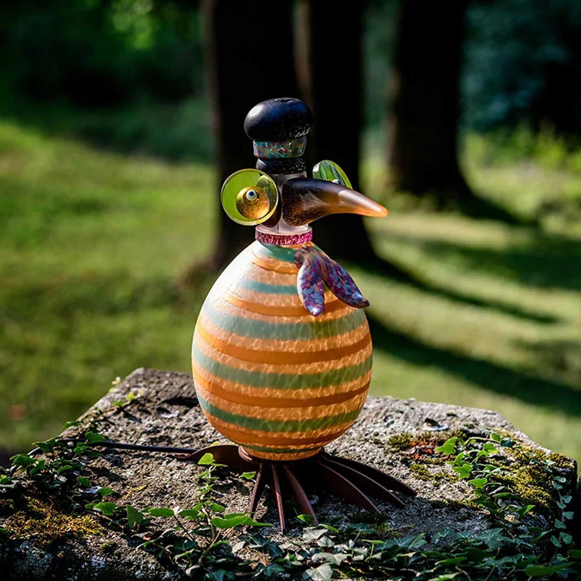 Outdoor bird sculpture with whimsical design, perfect for garden lighting and decor.