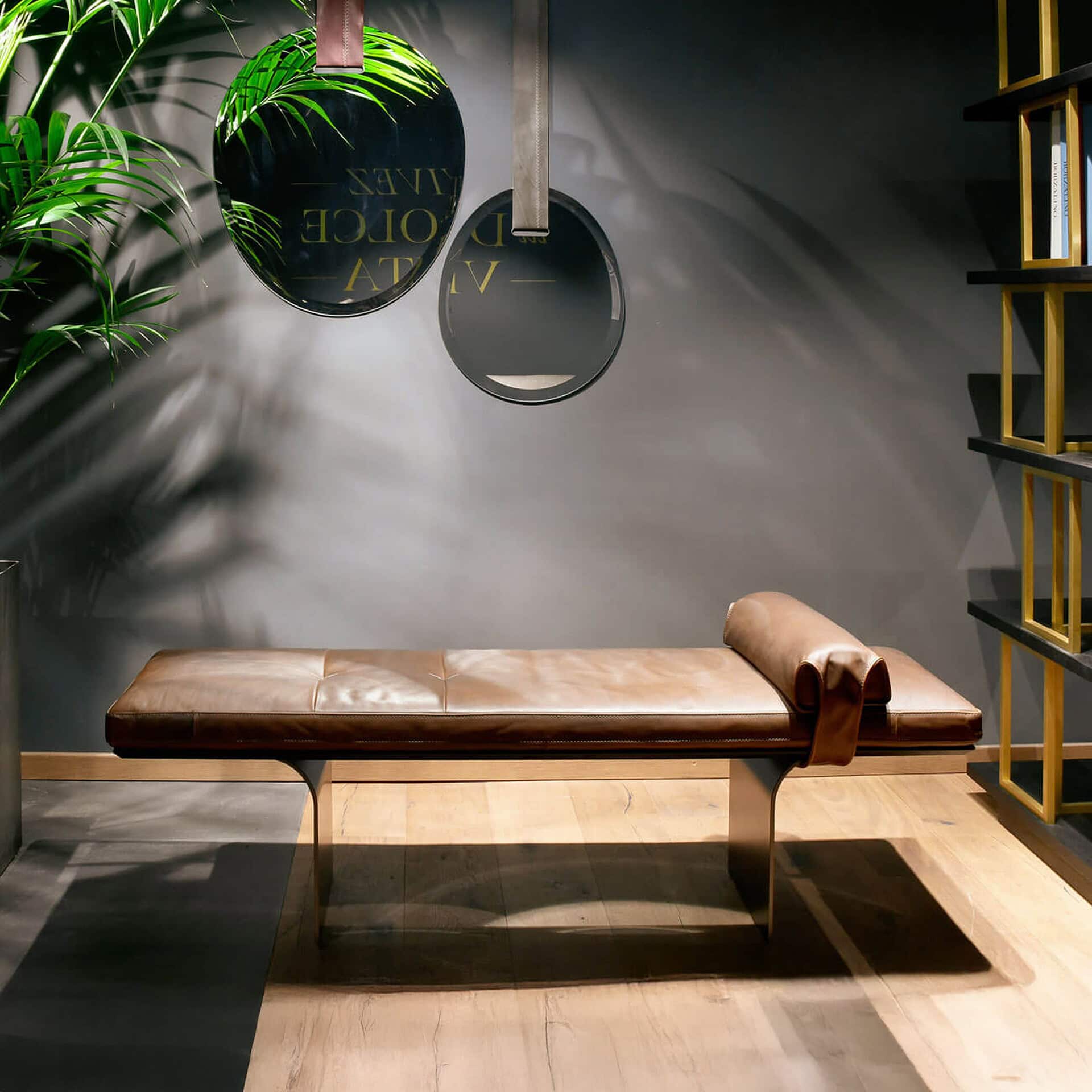 Leather bench with modern decor in a stylish interior setting.