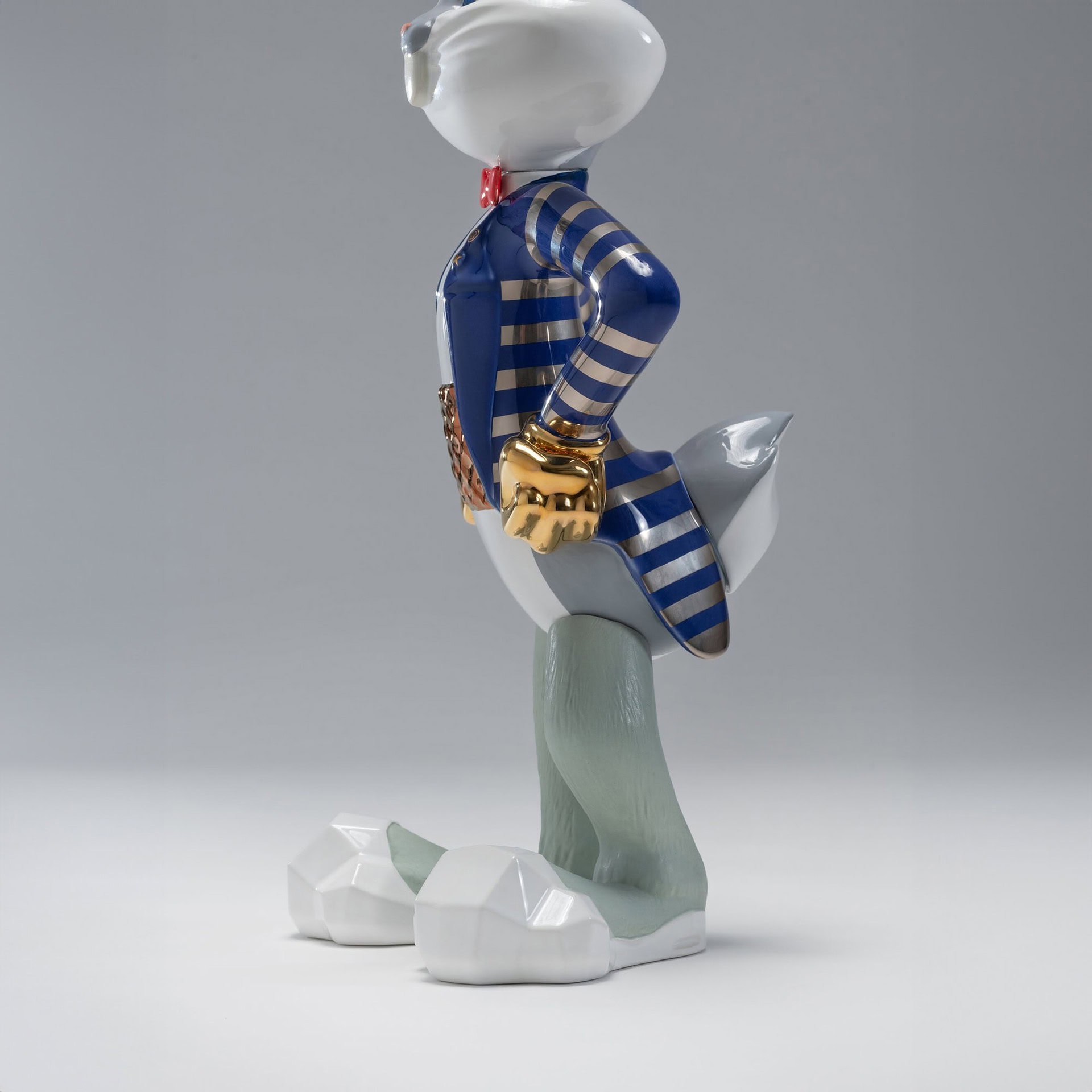 Rear angle of The Shiny Bugs Pop Art Sculpture with striped enamel jacket and sculpted ceramic finish.