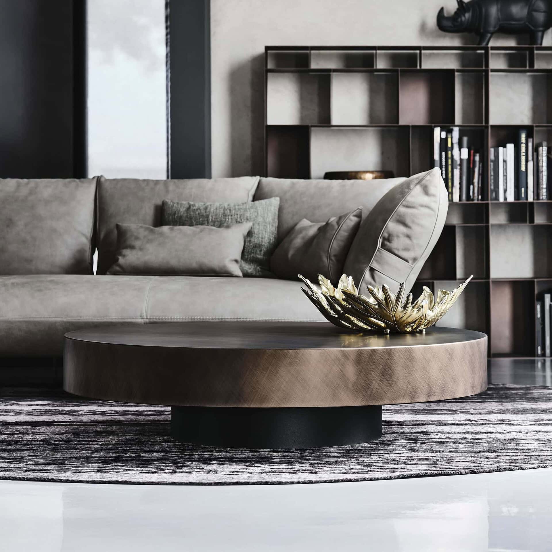 Arena Hand-Brushed Coffee Table finish showcased in a chic lounge area with grey sofa.