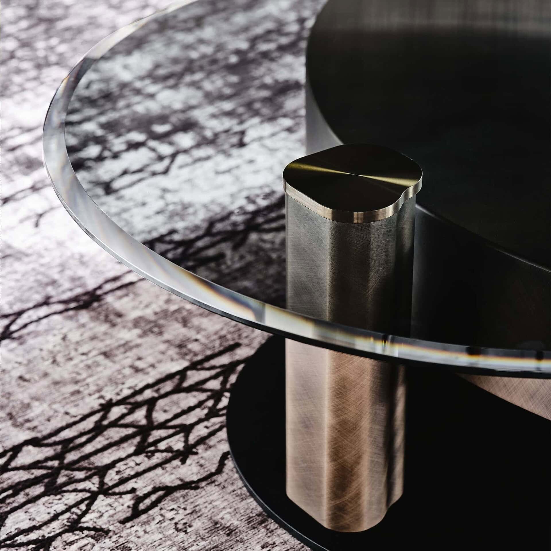 Arena Hand-Brushed Coffee Table in brushed grey finish styled with a modern sofa and warm-toned accessories.