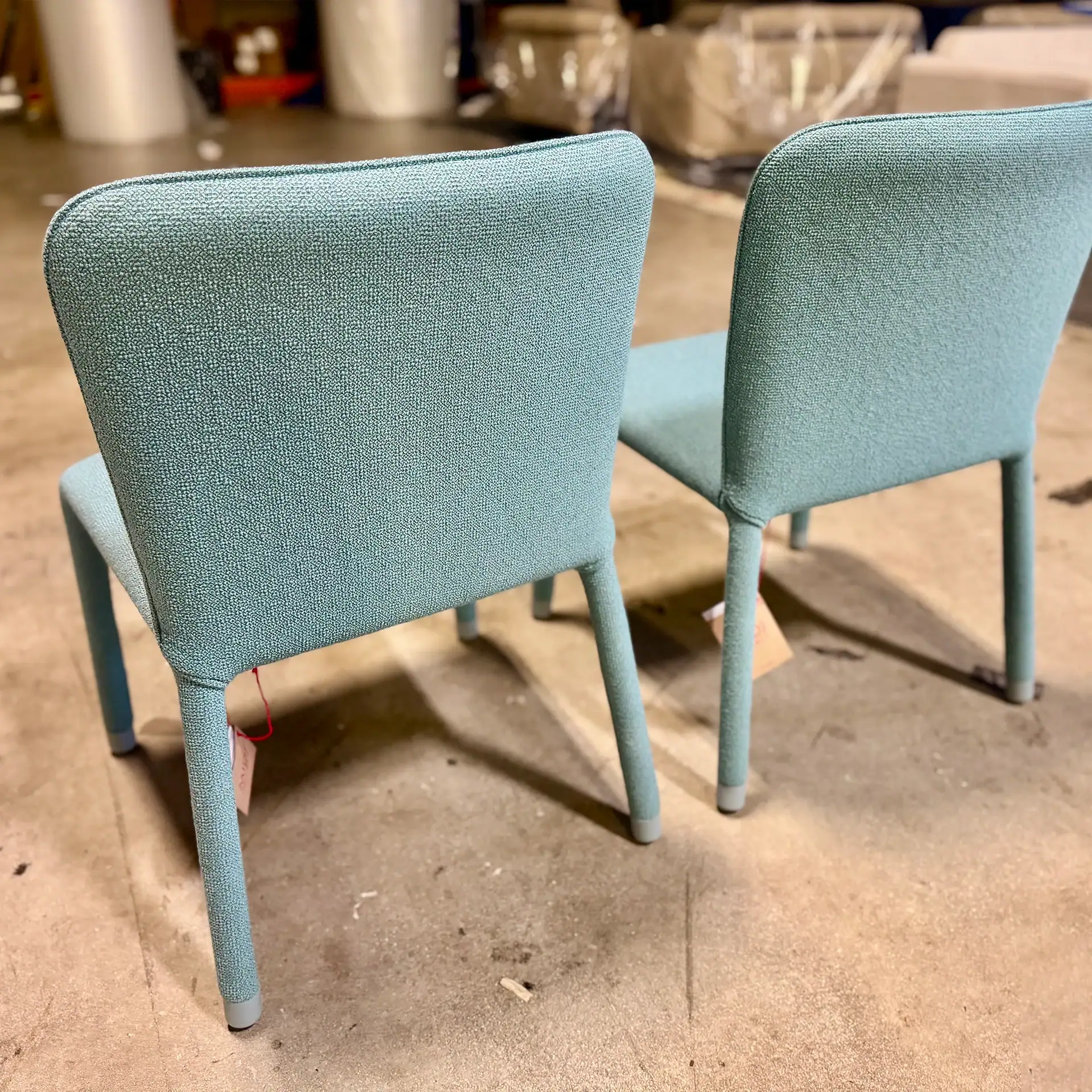 Set of two light blue Midj Millier chairs for modern interior decor.