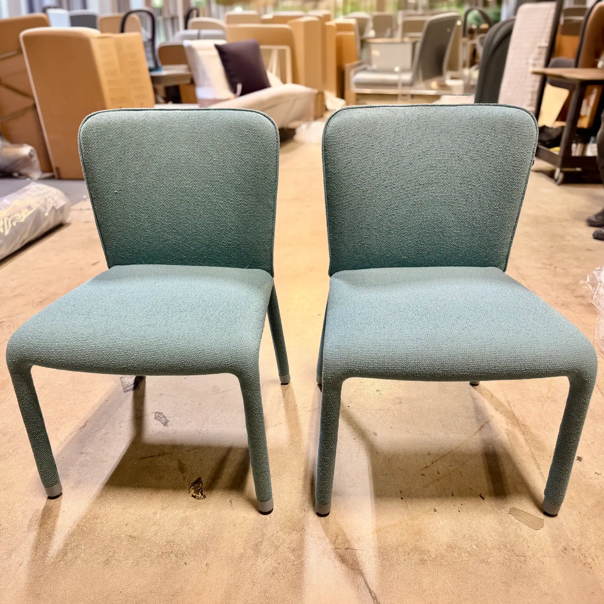 Pair of Midj Millier chairs in light blue upholstery for sale.