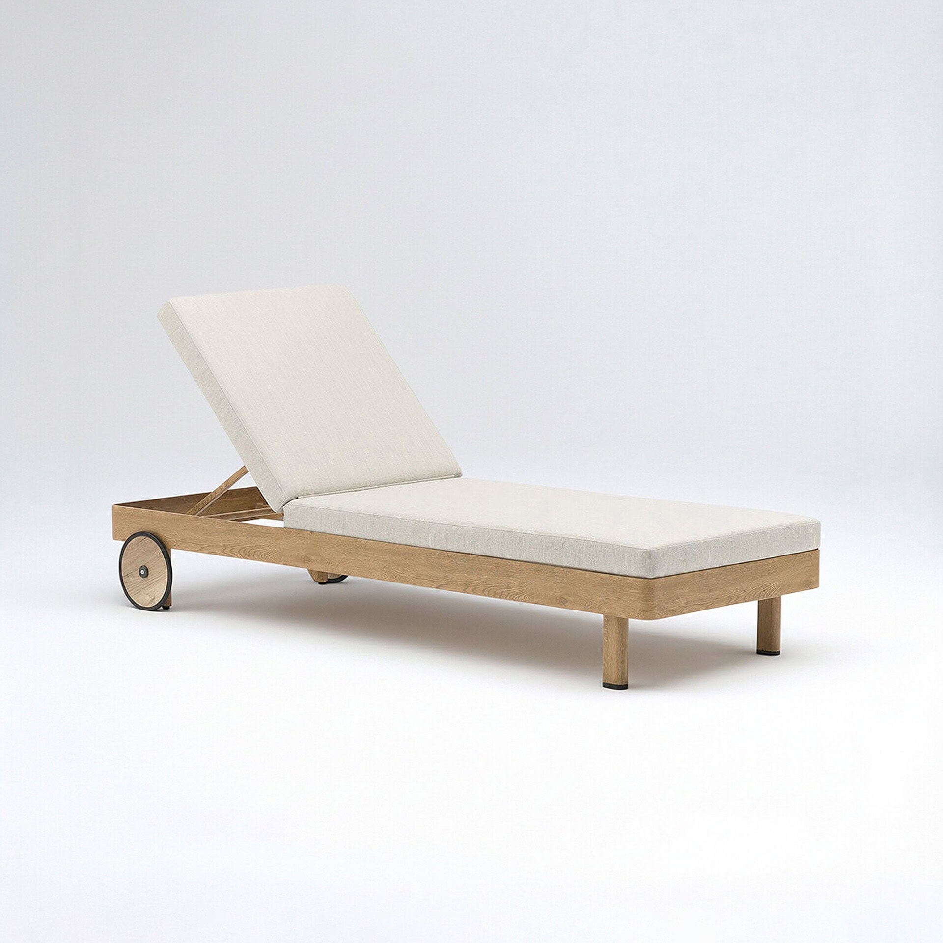 Studio image of the Couture Jardin Lounge Chaise Lounge with oak-finish aluminum frame and light cushioned seat, shown on a white background.